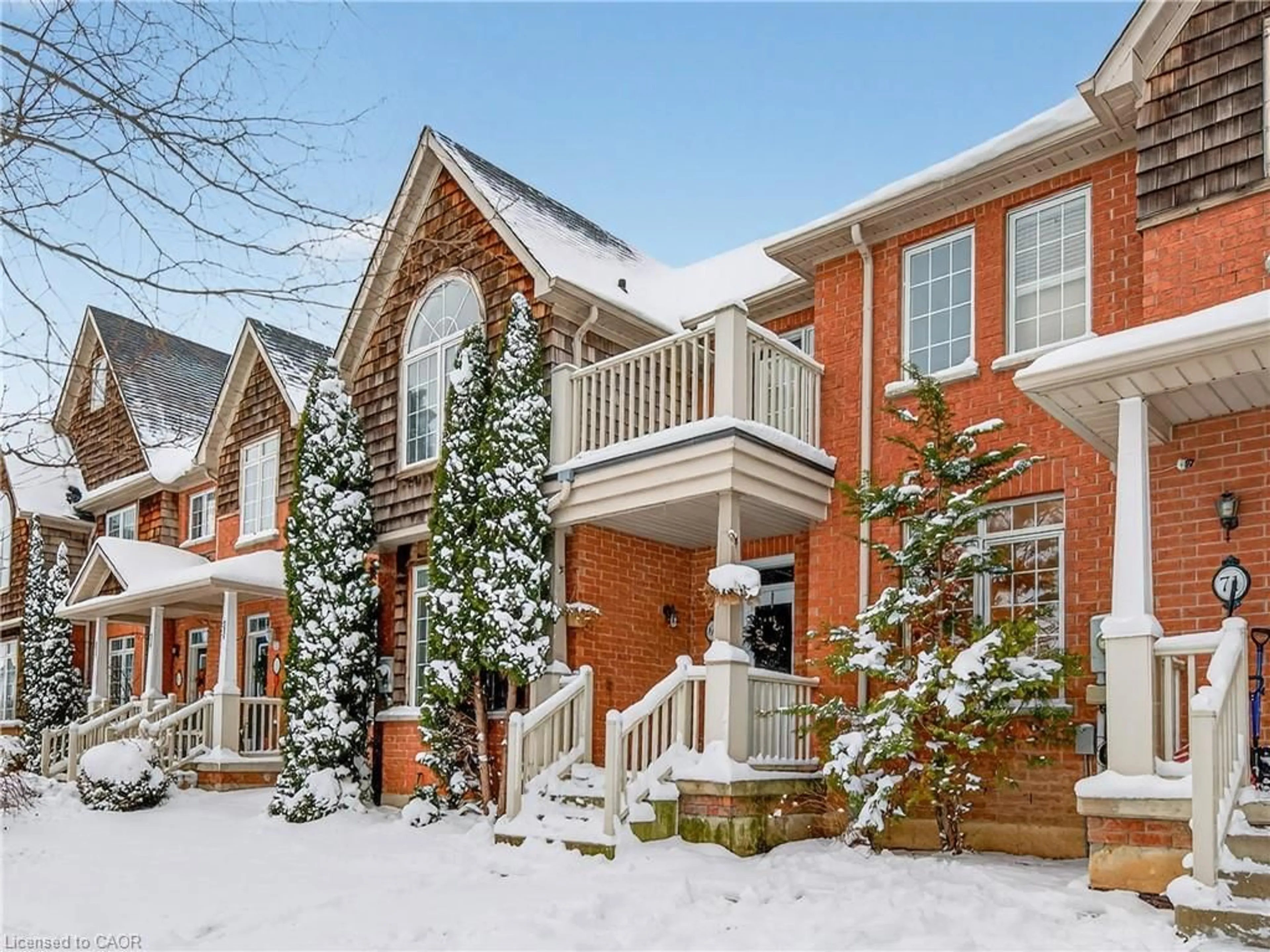 Home with brick exterior material, street for 69 Westhampton Way, Hamilton Ontario L8E 6C5