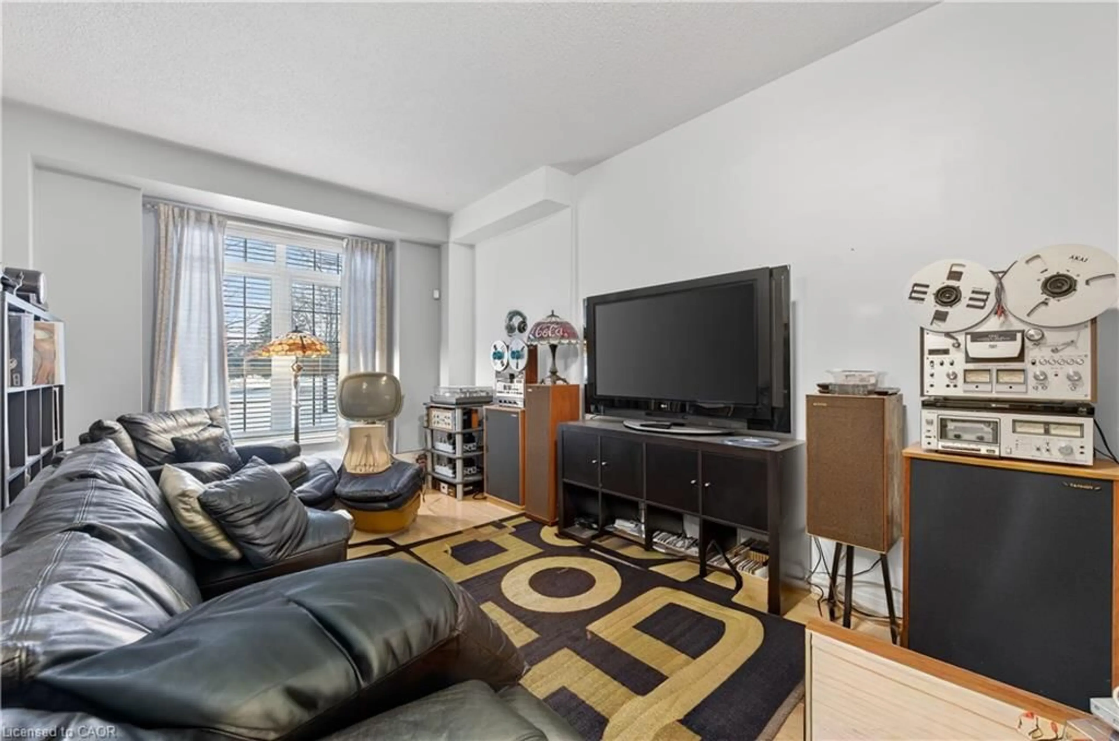 Living room with furniture, unknown for 69 Westhampton Way, Hamilton Ontario L8E 6C5