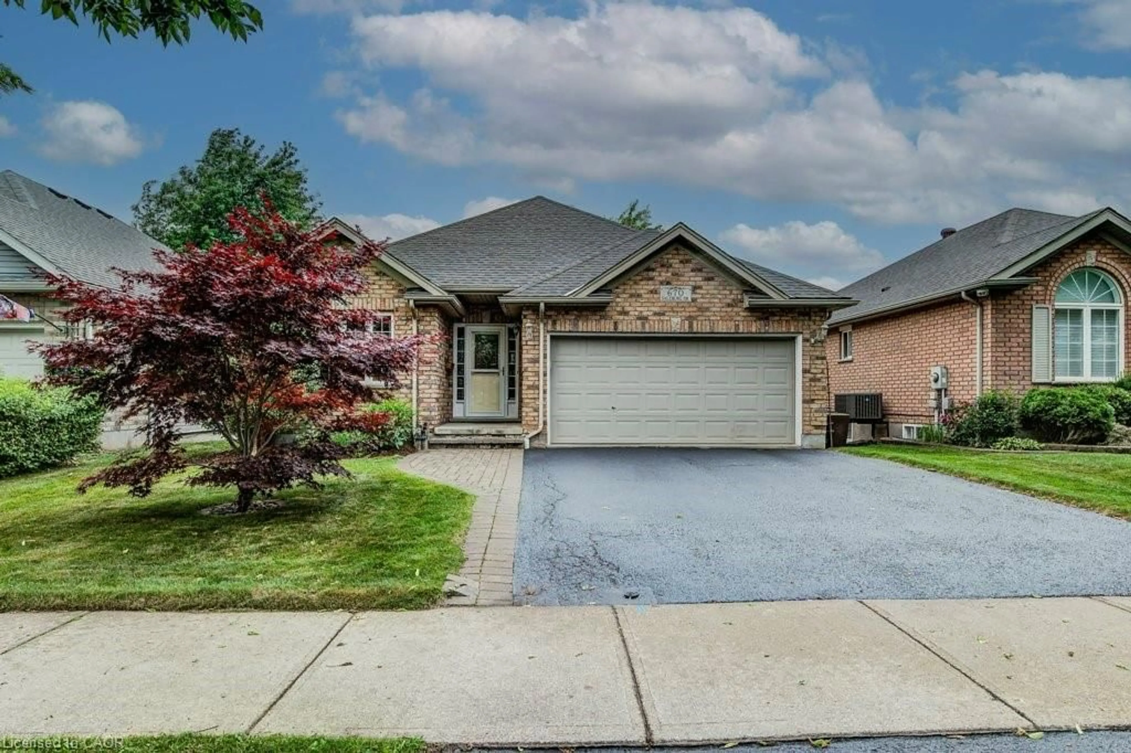 Home with brick exterior material, street for 670 Salzburg Dr, Waterloo Ontario N2V 2N8