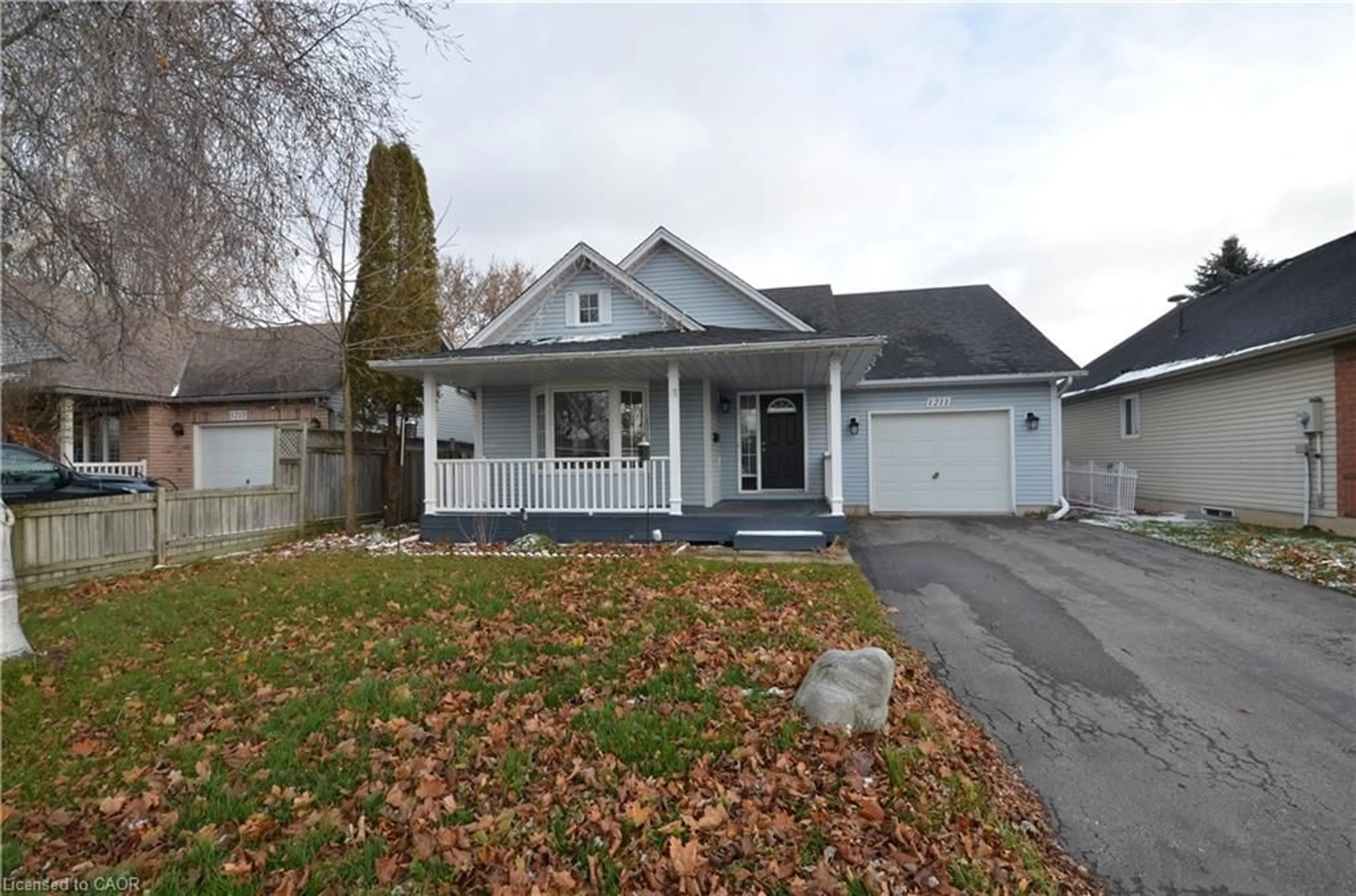 Home with vinyl exterior material, street for 1211 Tamarac St, Dunnville Ontario N1A 3G6