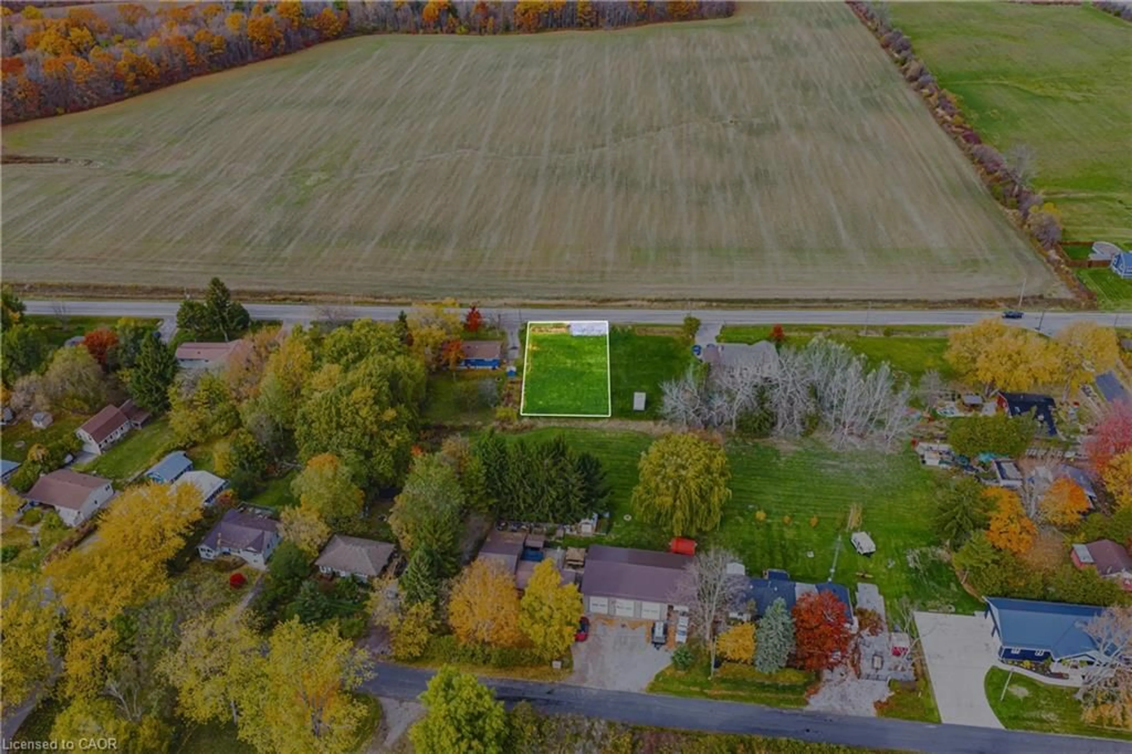 A pic from outside/outdoor area/front of a property/back of a property/a pic from drone, street for 610 New Lakeshore Rd, Port Dover Ontario N0A 1N3