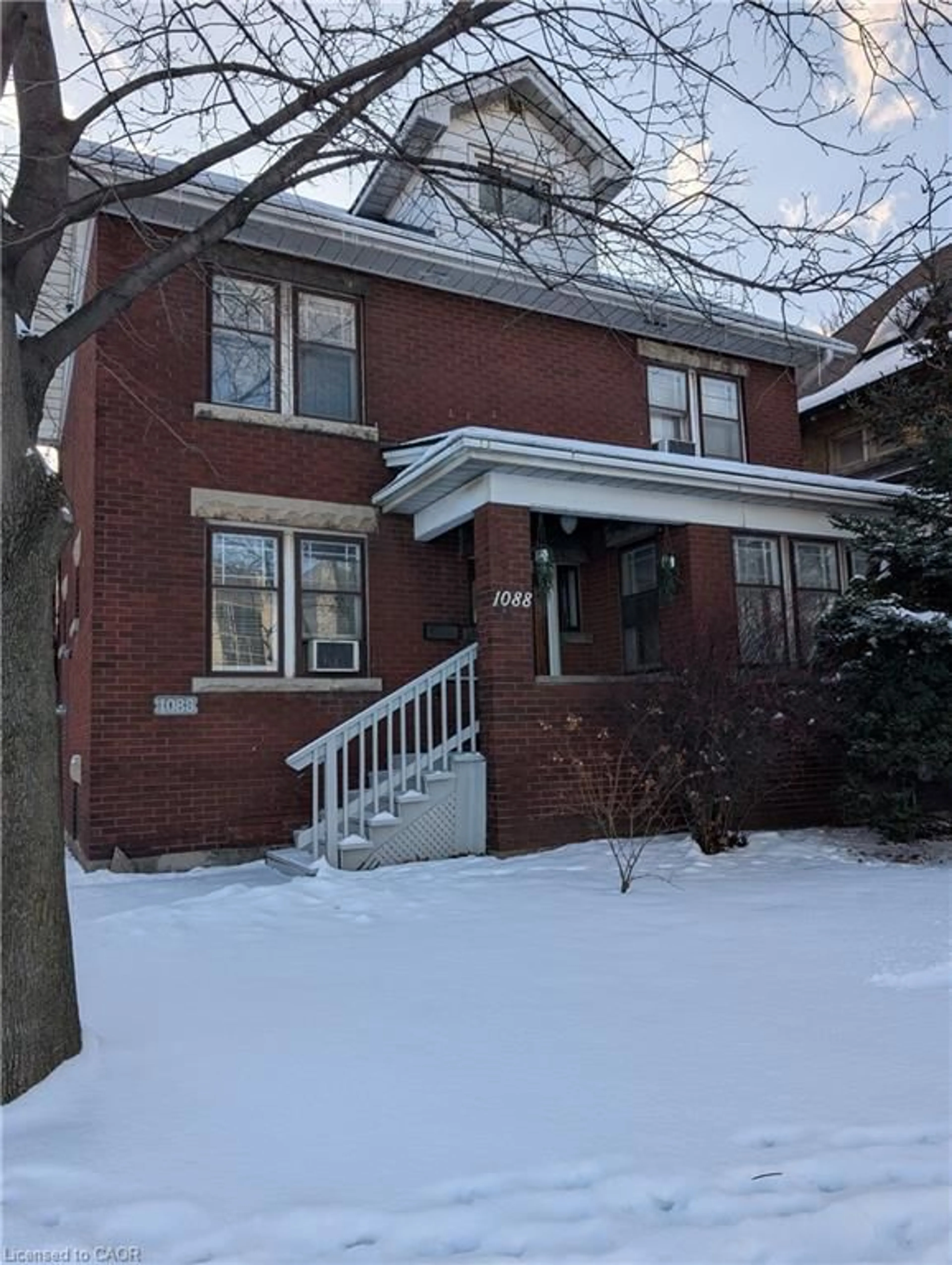 Home with brick exterior material, street for 1088 King St, Hamilton Ontario L8M 1E3