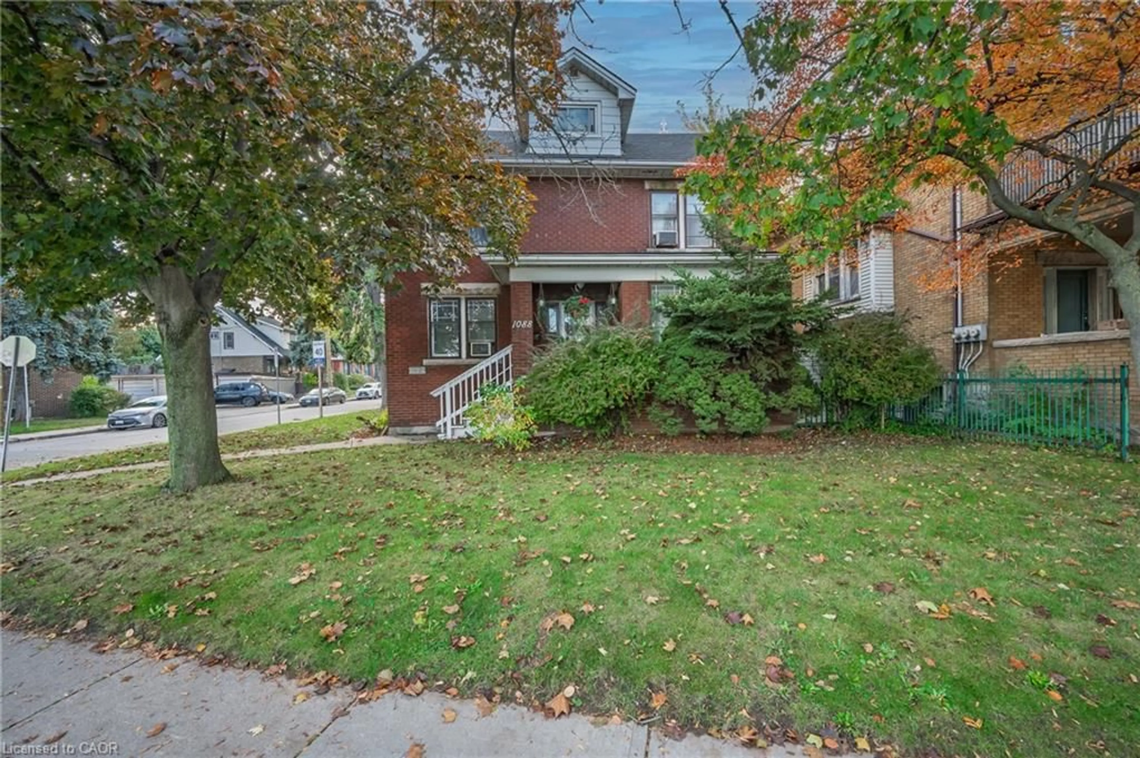 Home with brick exterior material, street for 1088 King St, Hamilton Ontario L8M 1E3