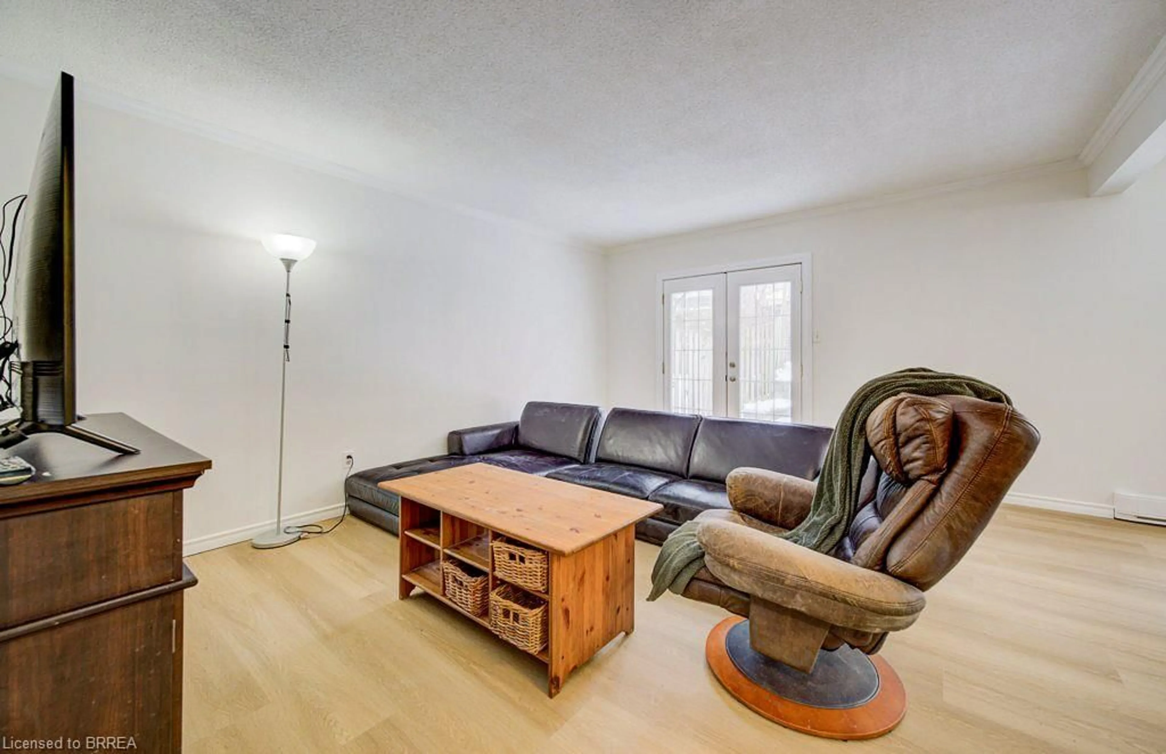 Living room with furniture, wood/laminate floor for 6 Emily St, Paris Ontario N3L 1N5