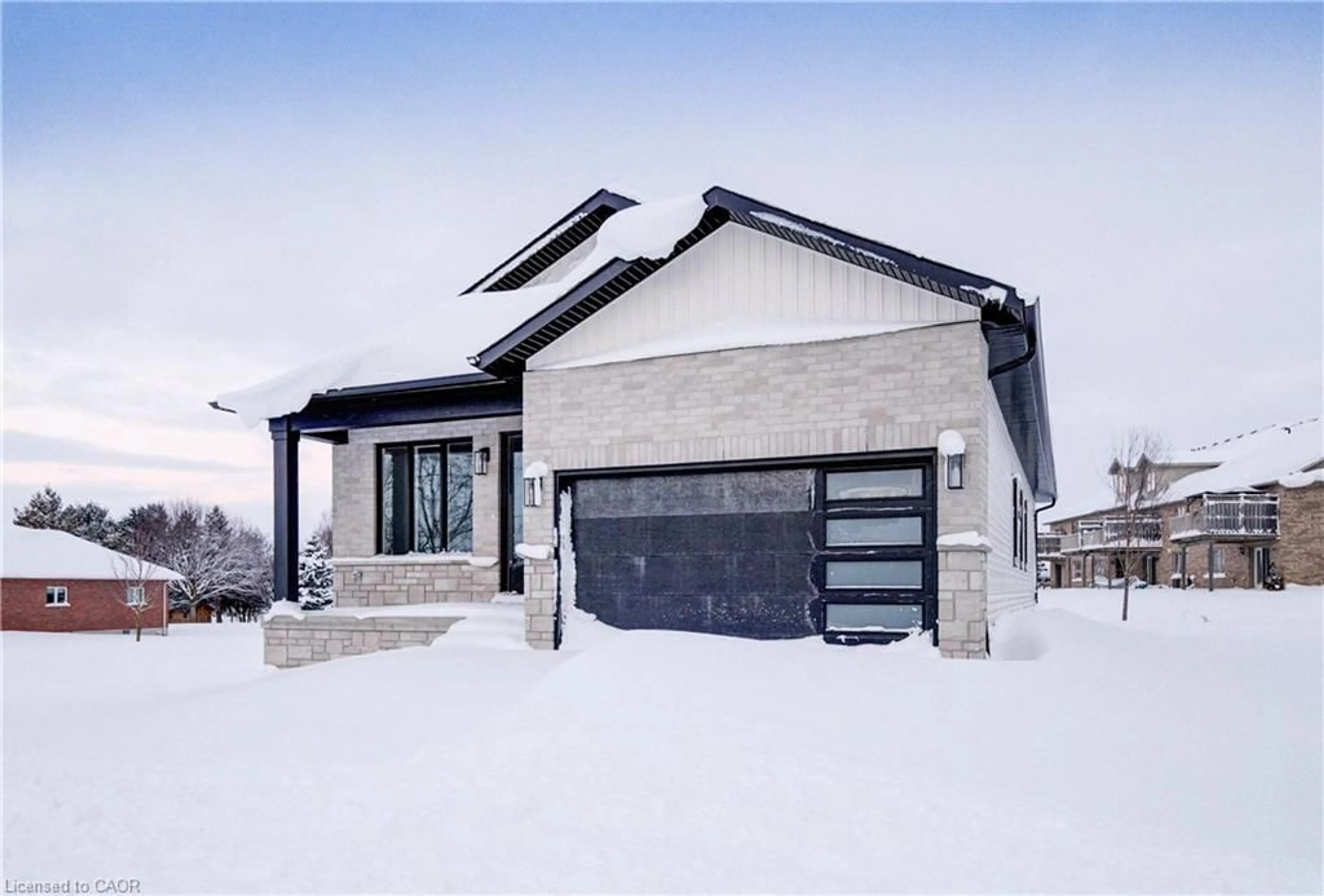 Home with brick exterior material, street for 647 Martin St, Mount Forest Ontario N0G 2L3