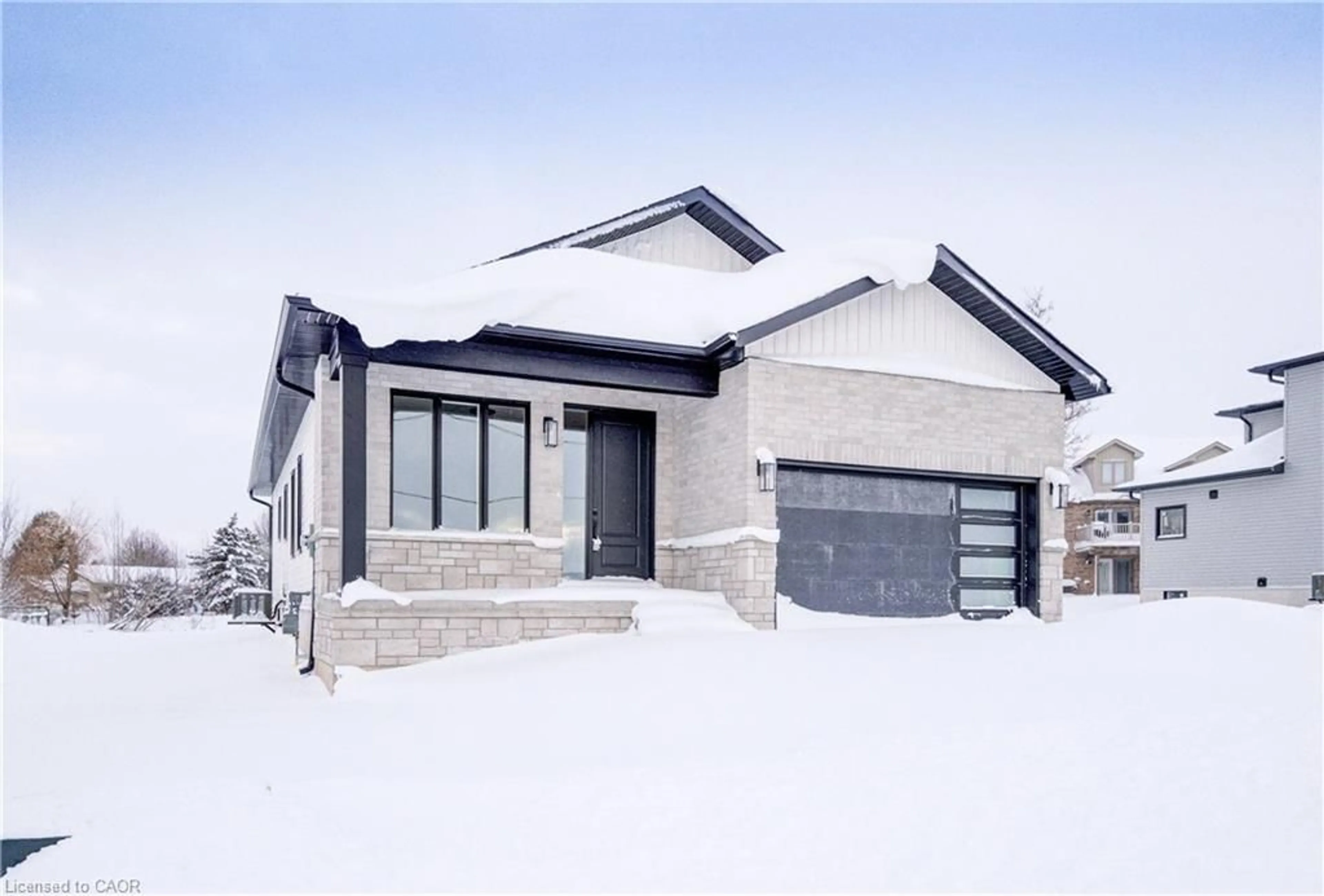 Home with brick exterior material, street for 647 Martin St, Mount Forest Ontario N0G 2L3