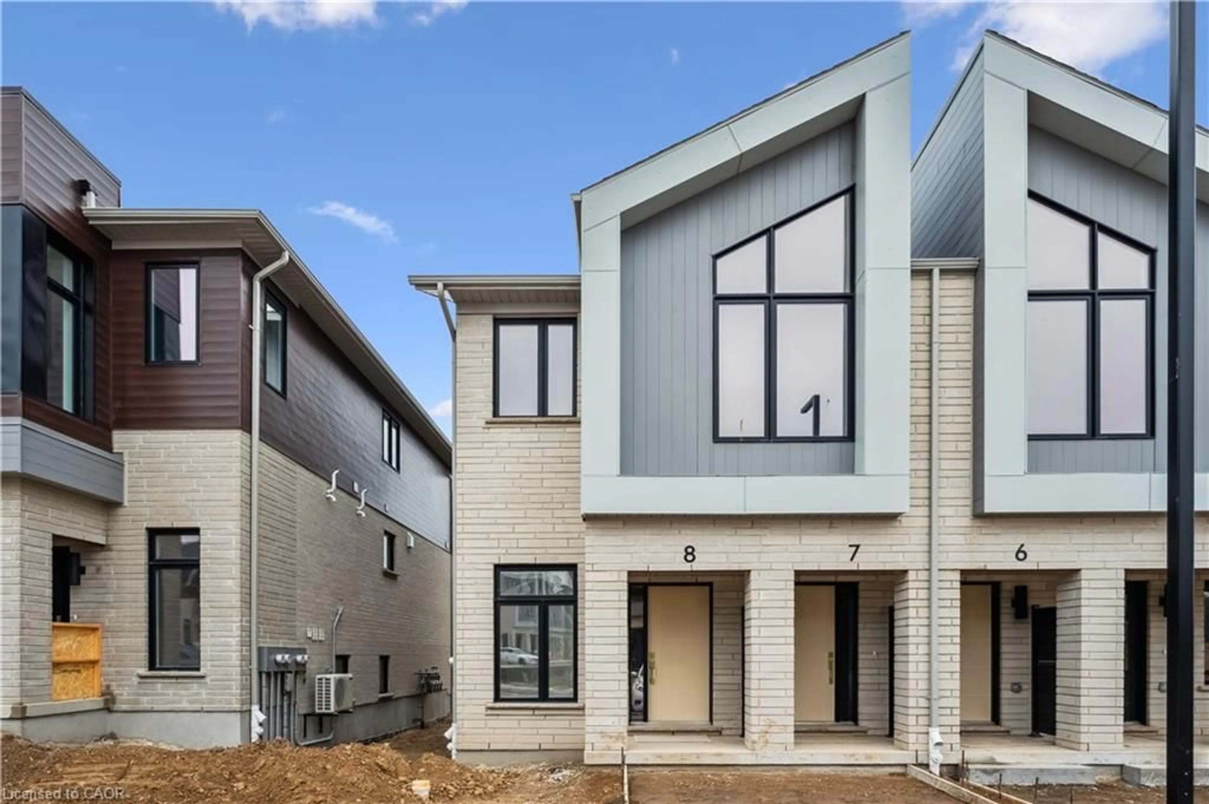 Home with brick exterior material, street for 15 Stauffer Woods Trail #B8, Kitchener Ontario N2P 2P4