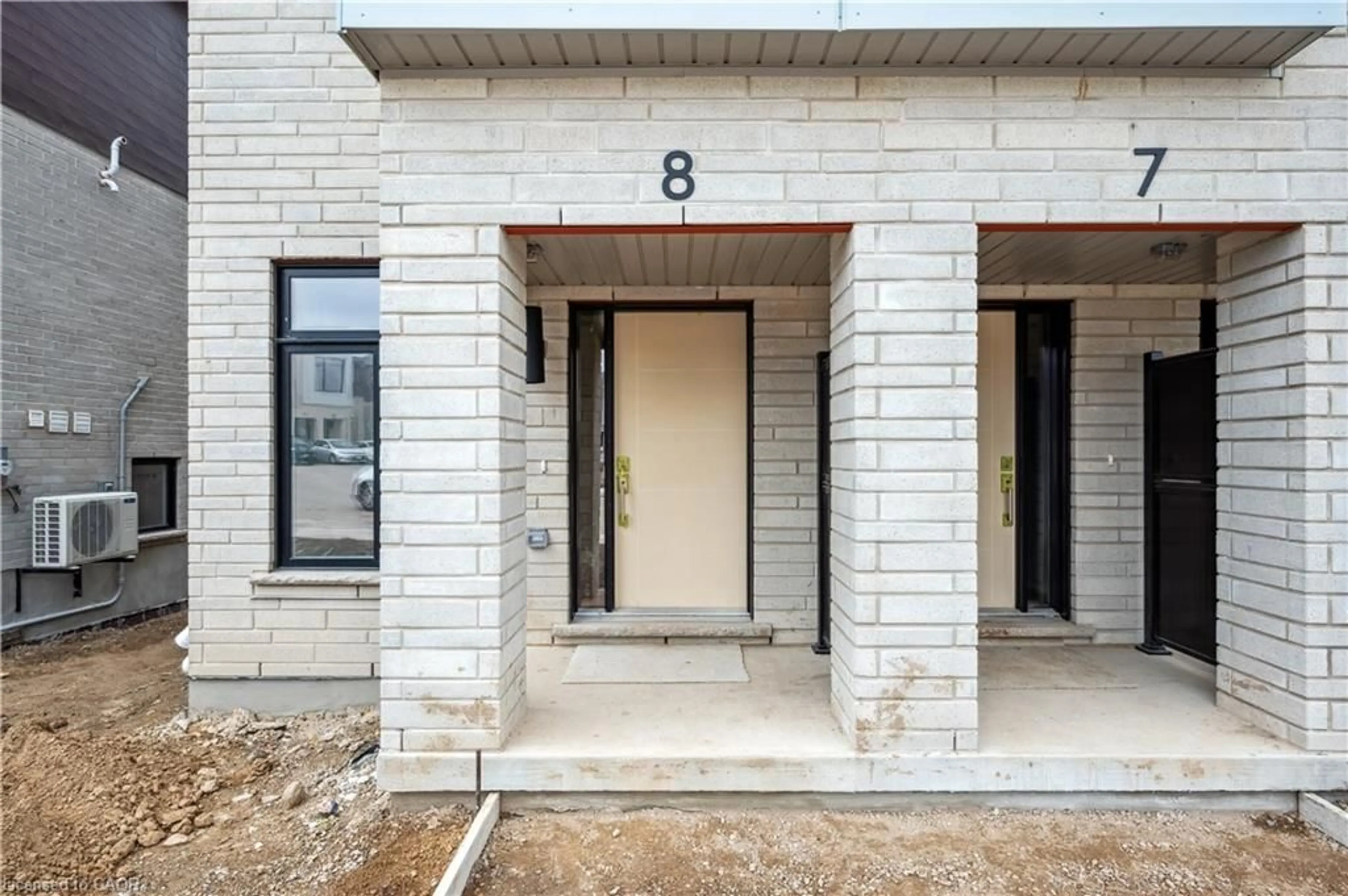 Home with brick exterior material, street for 15 Stauffer Woods Trail #B8, Kitchener Ontario N2P 2P4