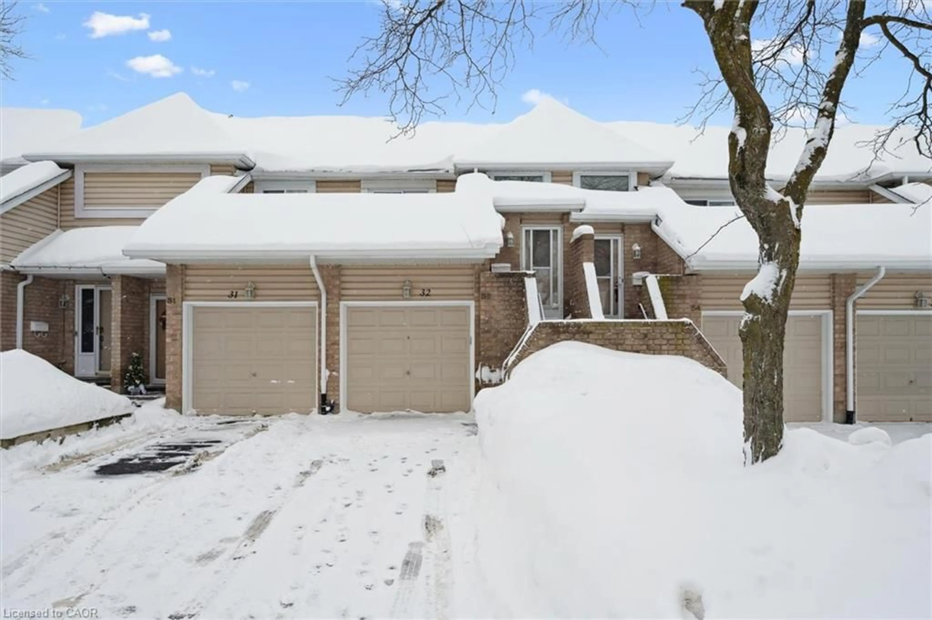 A pic from outside/outdoor area/front of a property/back of a property/a pic from drone, street for 205 Highland Cres #32, Kitchener Ontario N2M 5L7