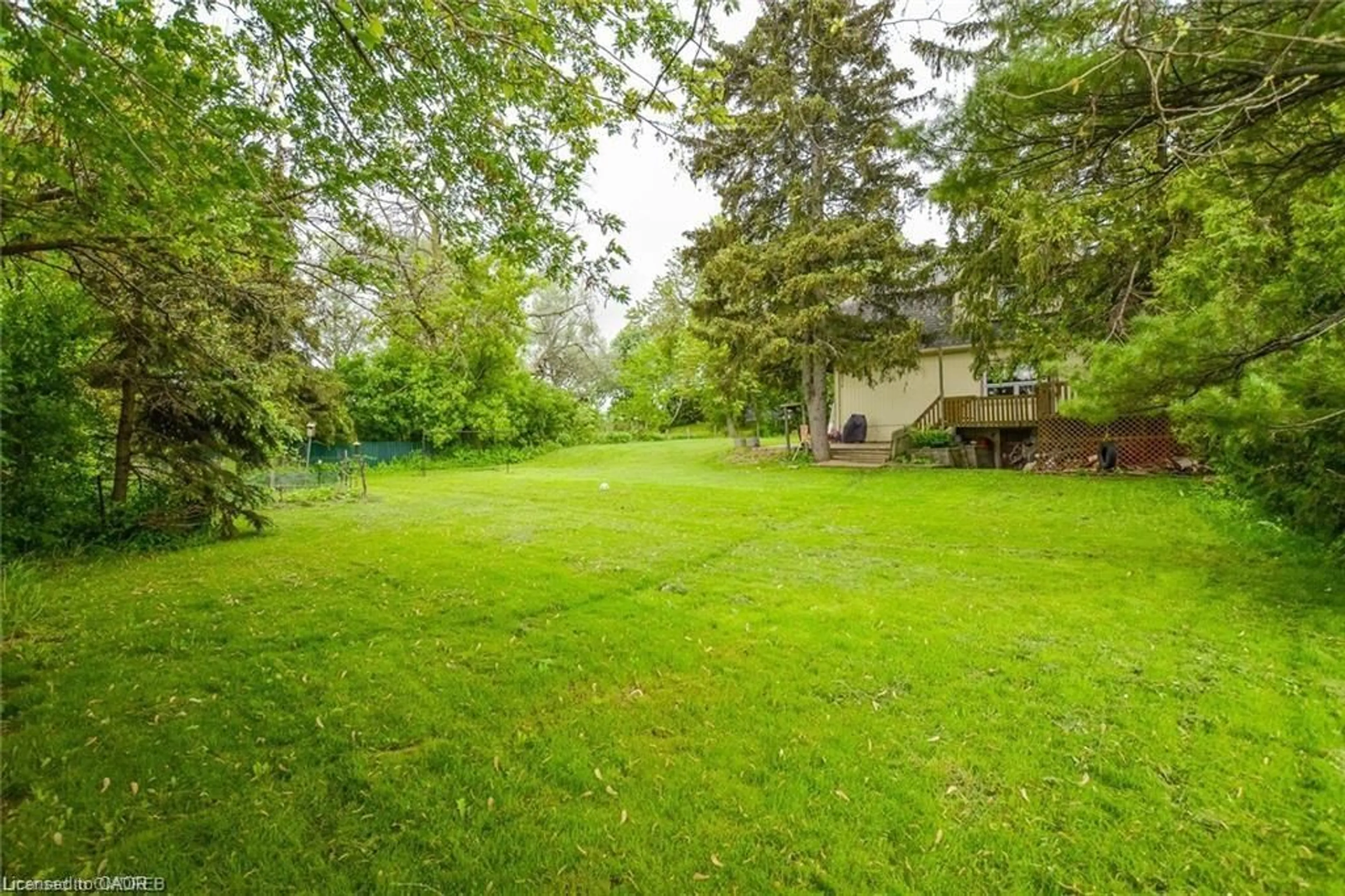 Patio, forest/trees view for 12938 Tenth Side Road, Halton Hills Ontario L7G 4S8