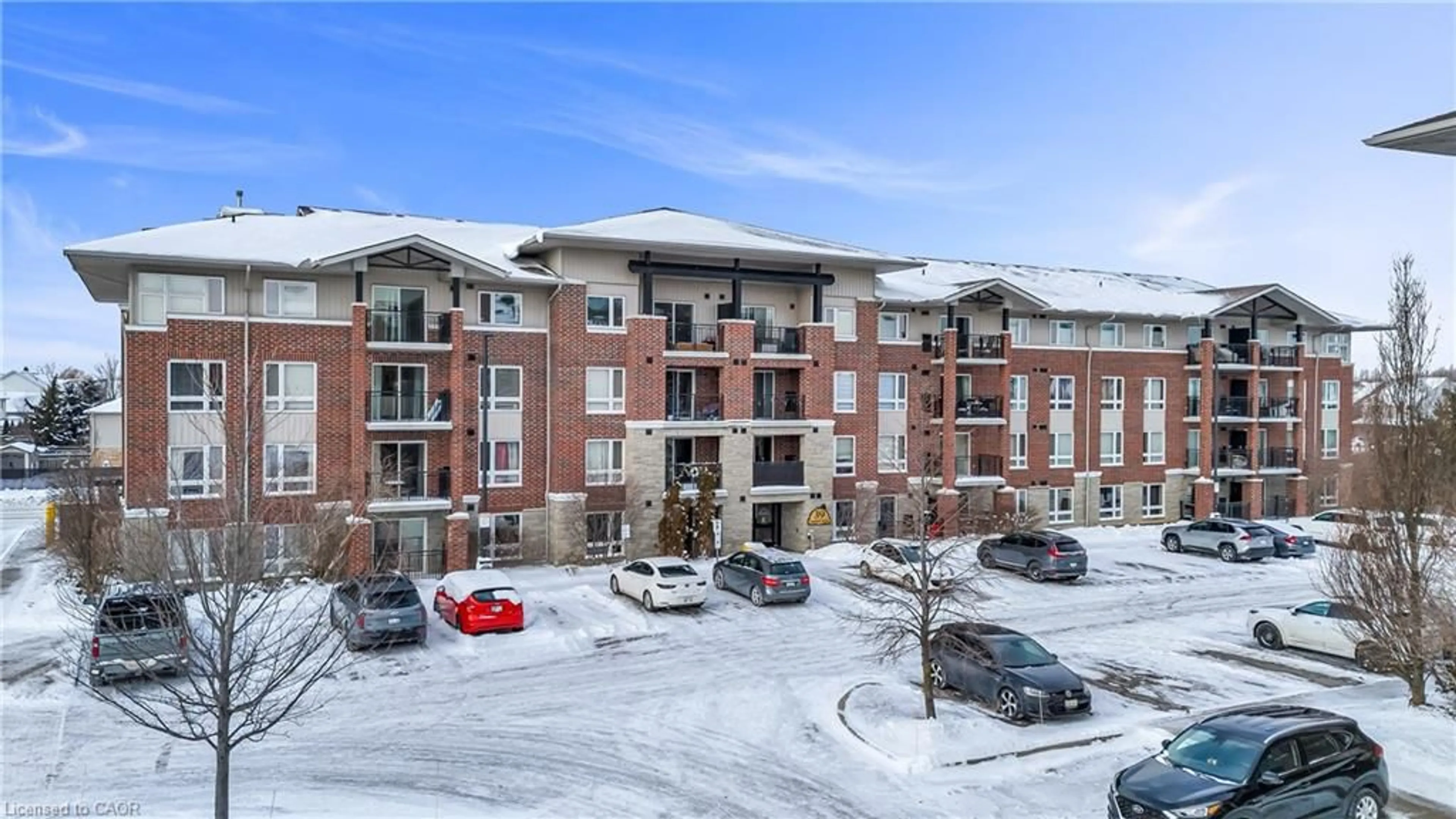 A pic from outside/outdoor area/front of a property/back of a property/a pic from drone, mountain view for 39 Goodwin Dr #309, Guelph Ontario N1L 0E5