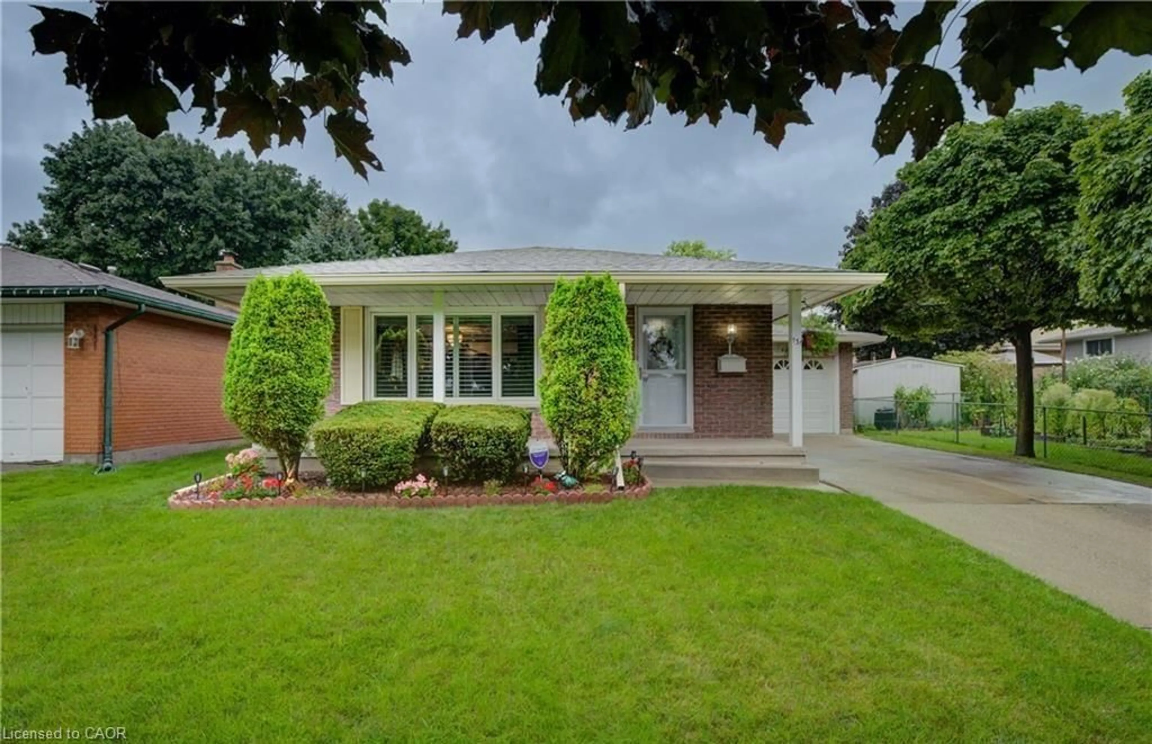 Home with vinyl exterior material, street for 131 Gracefield Cres, Kitchener Ontario N2E 1R8