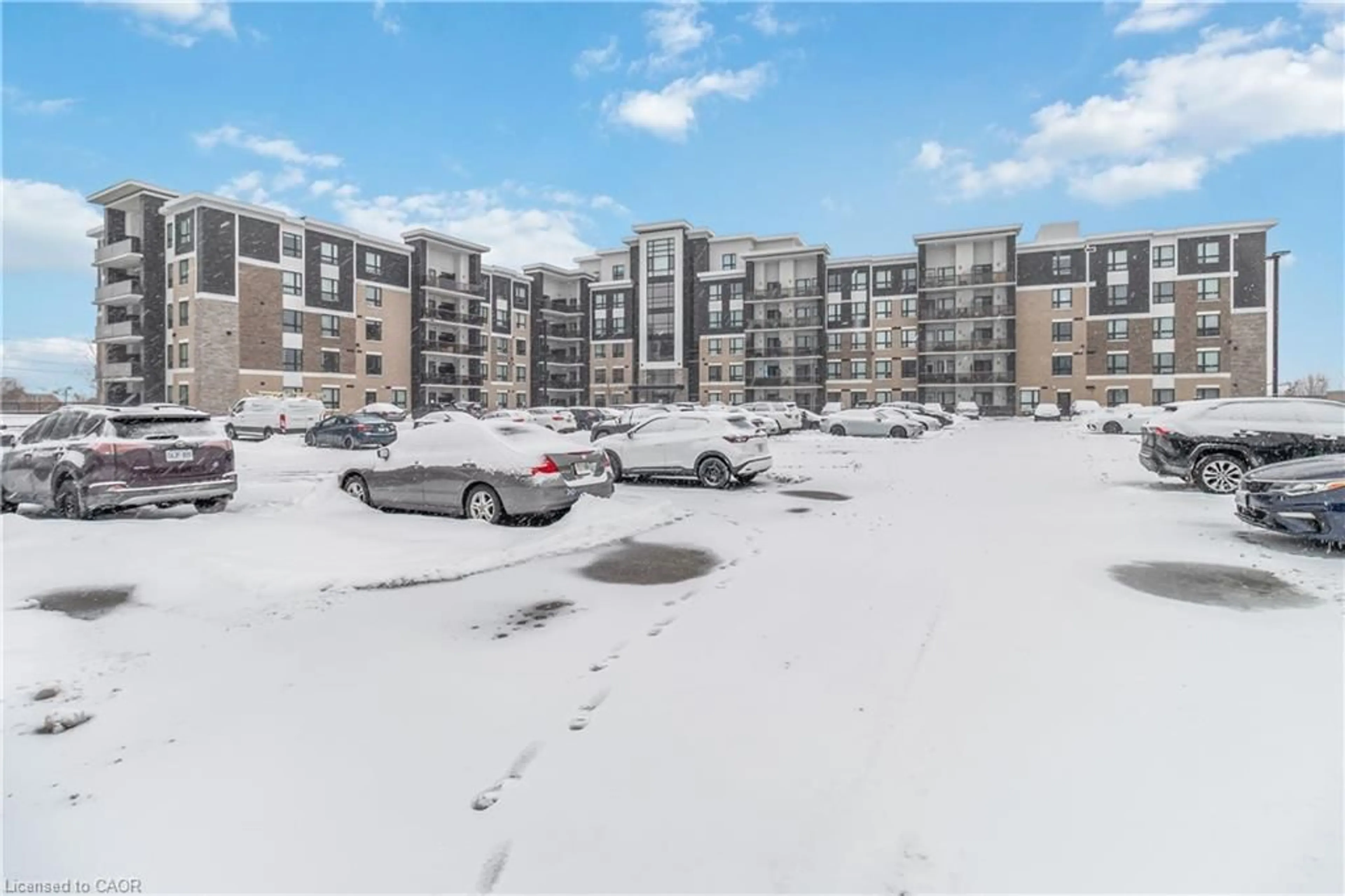 A pic from outside/outdoor area/front of a property/back of a property/a pic from drone, unknown for 640 Sauve St #421, Milton Ontario L9T 9A7