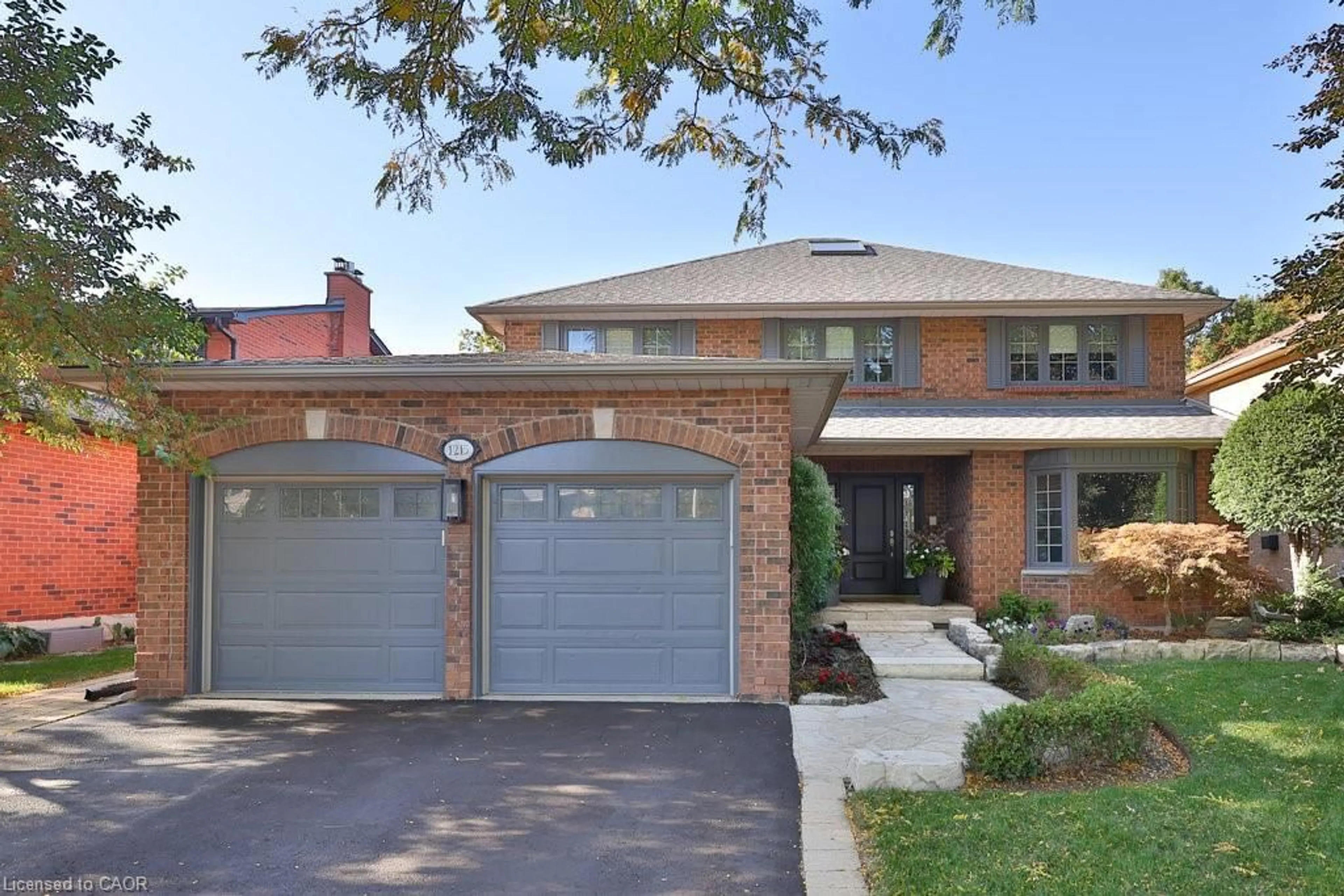 Home with brick exterior material, street for 1215 Rushbrooke Dr, Oakville Ontario L6M 1H8
