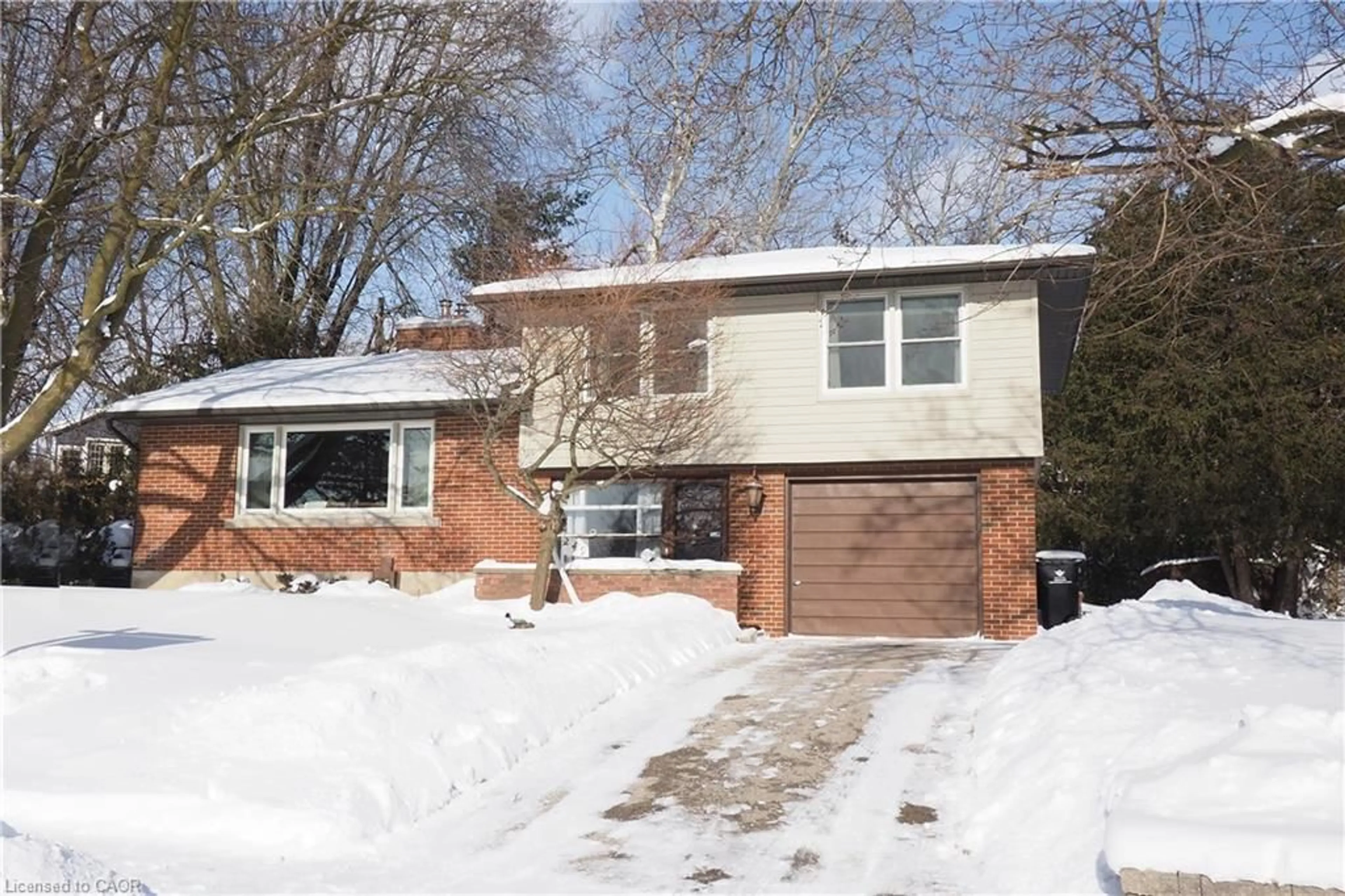 Home with brick exterior material, street for 249 Murdock Ave, Waterloo Ontario N2J 2M6