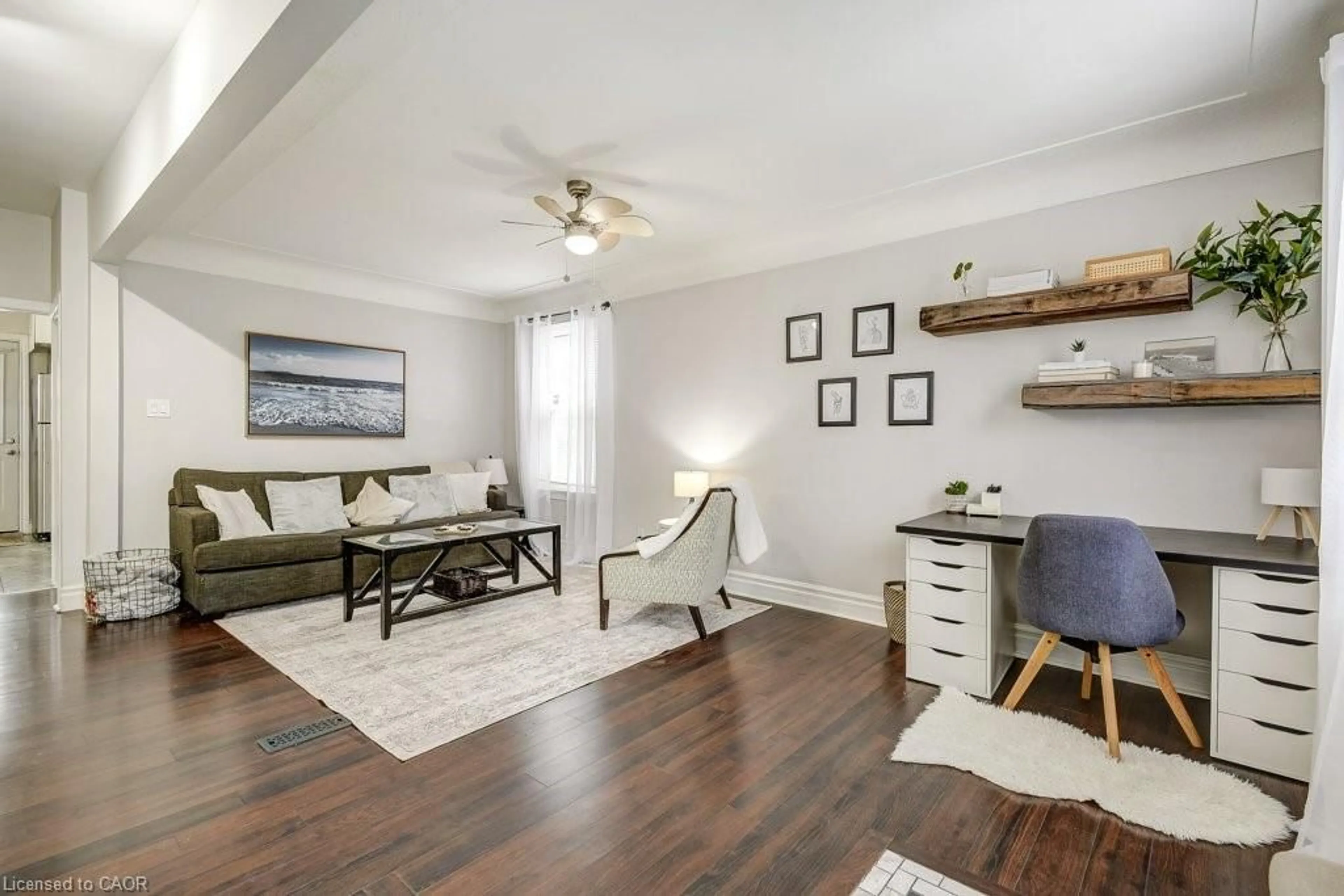 Living room with furniture, wood/laminate floor for 14 Baker St, Hamilton Ontario L8R 1V3