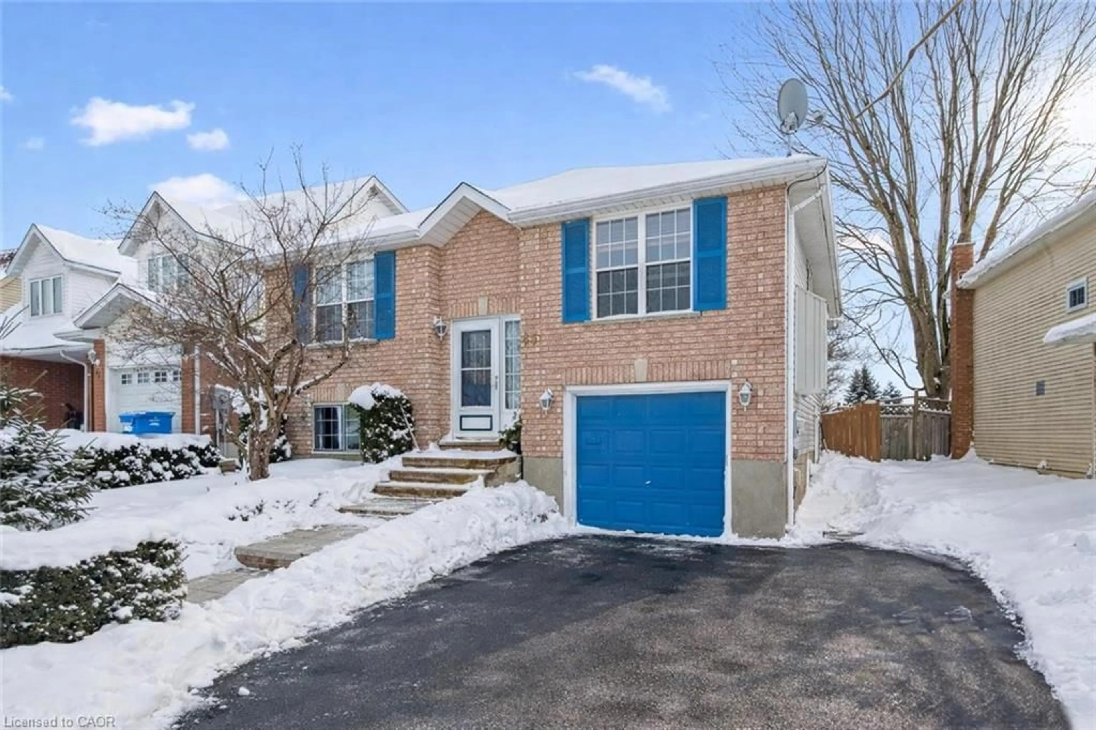 Home with brick exterior material, street for 45 Chesterton Lane, Guelph Ontario N1E 6S8