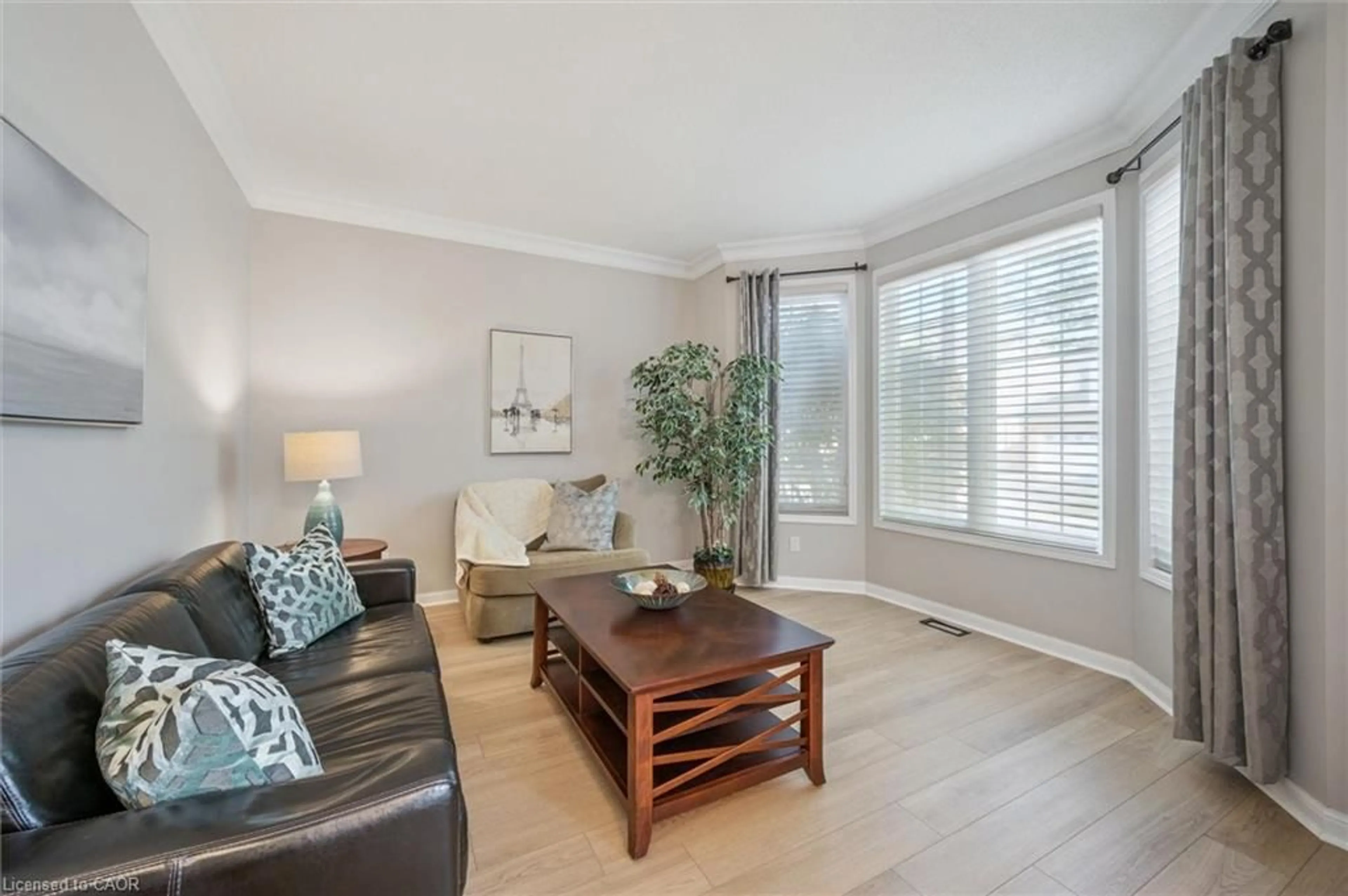 Living room with furniture, wood/laminate floor for 79 Zieman Cres, Cambridge Ontario N1T 2H5