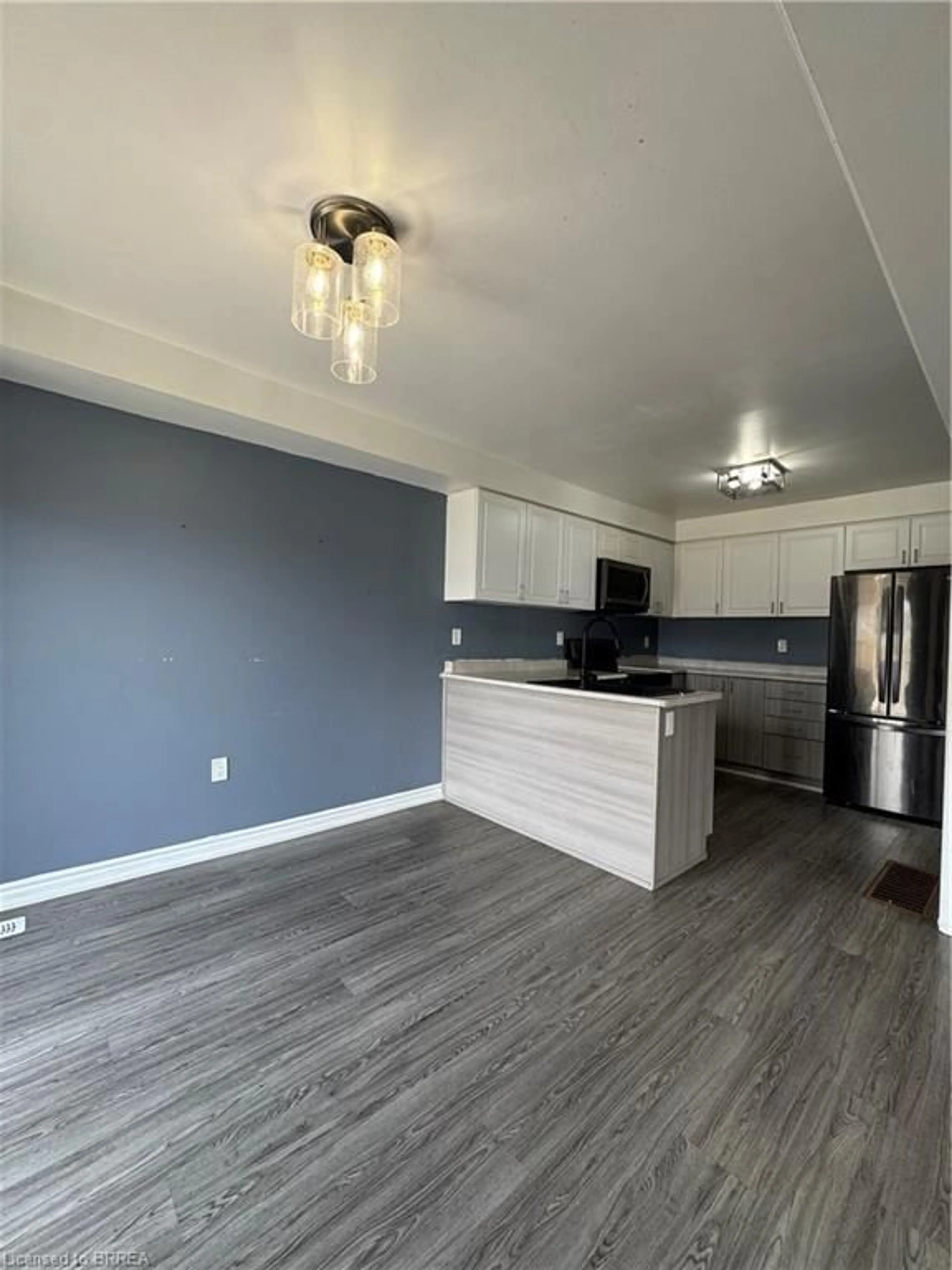 Open concept kitchen, wood/laminate floor for 22 Todd Cres, Dundalk Ontario N0C 1B0