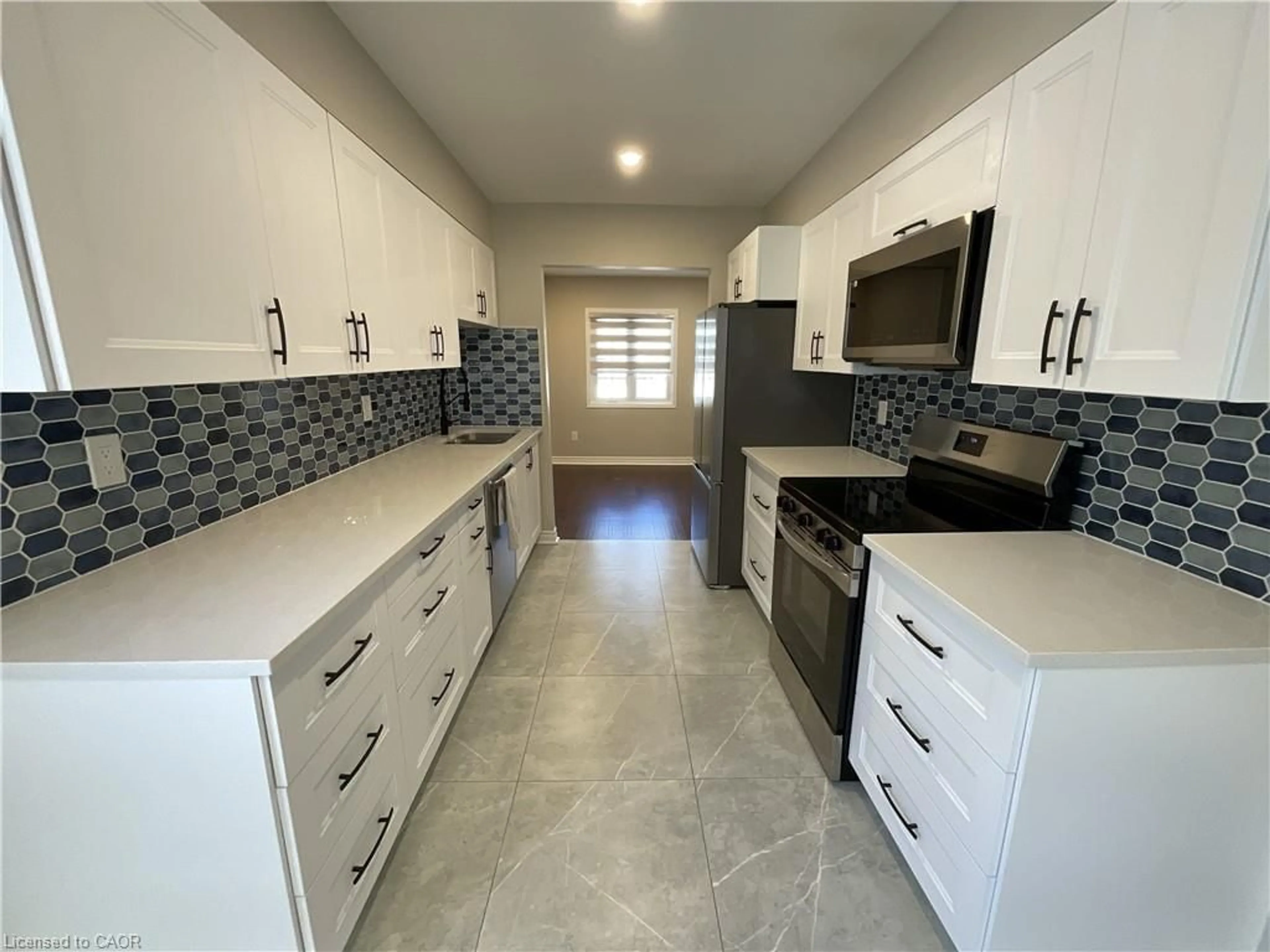 Open concept kitchen, ceramic/tile floor for 2110 Cleaver Ave #244, Burlington Ontario L7M 3Z3