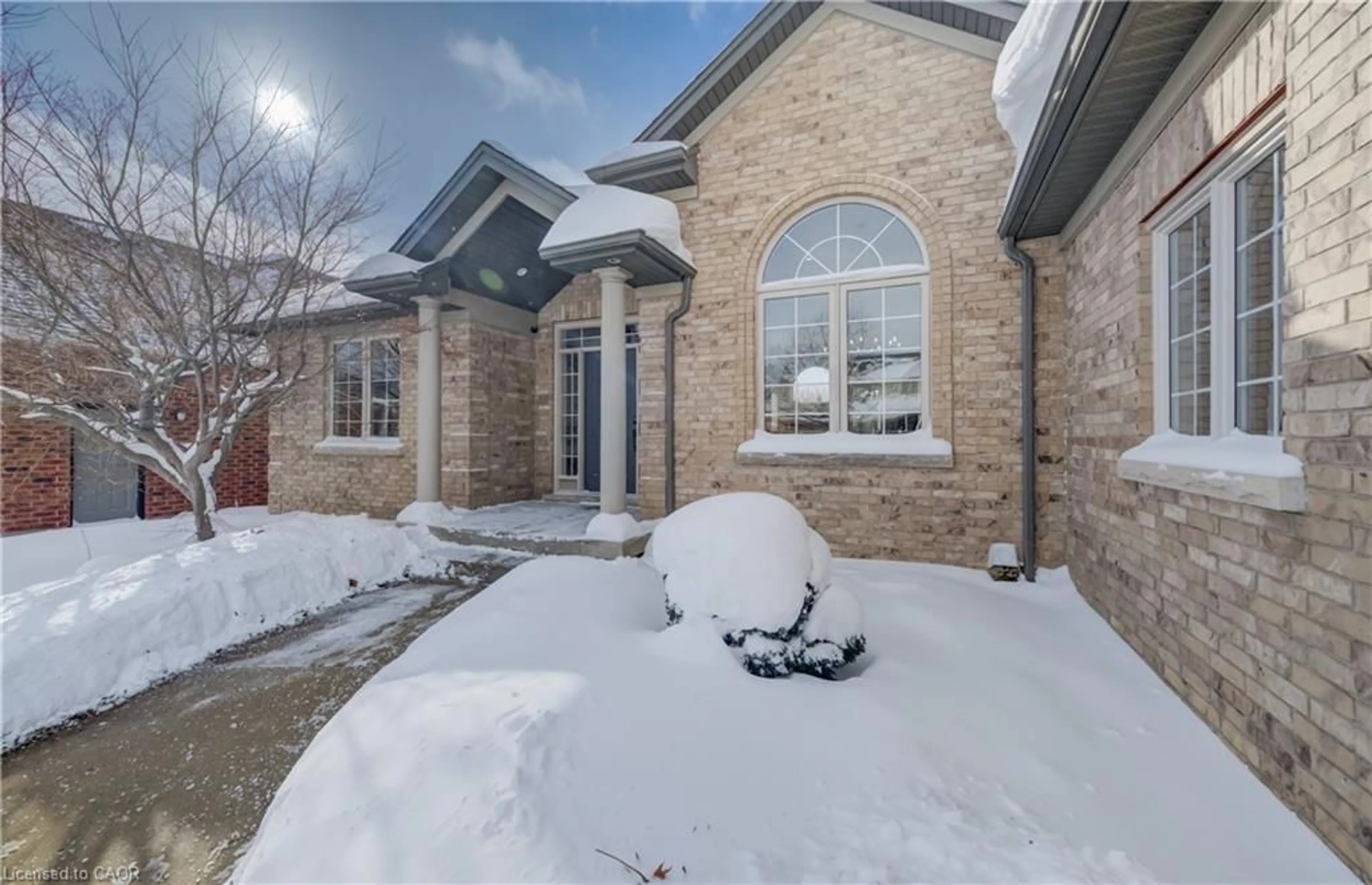 Home with brick exterior material, street for 31 Fall Harvest Dr, Kitchener Ontario N2P 2M2