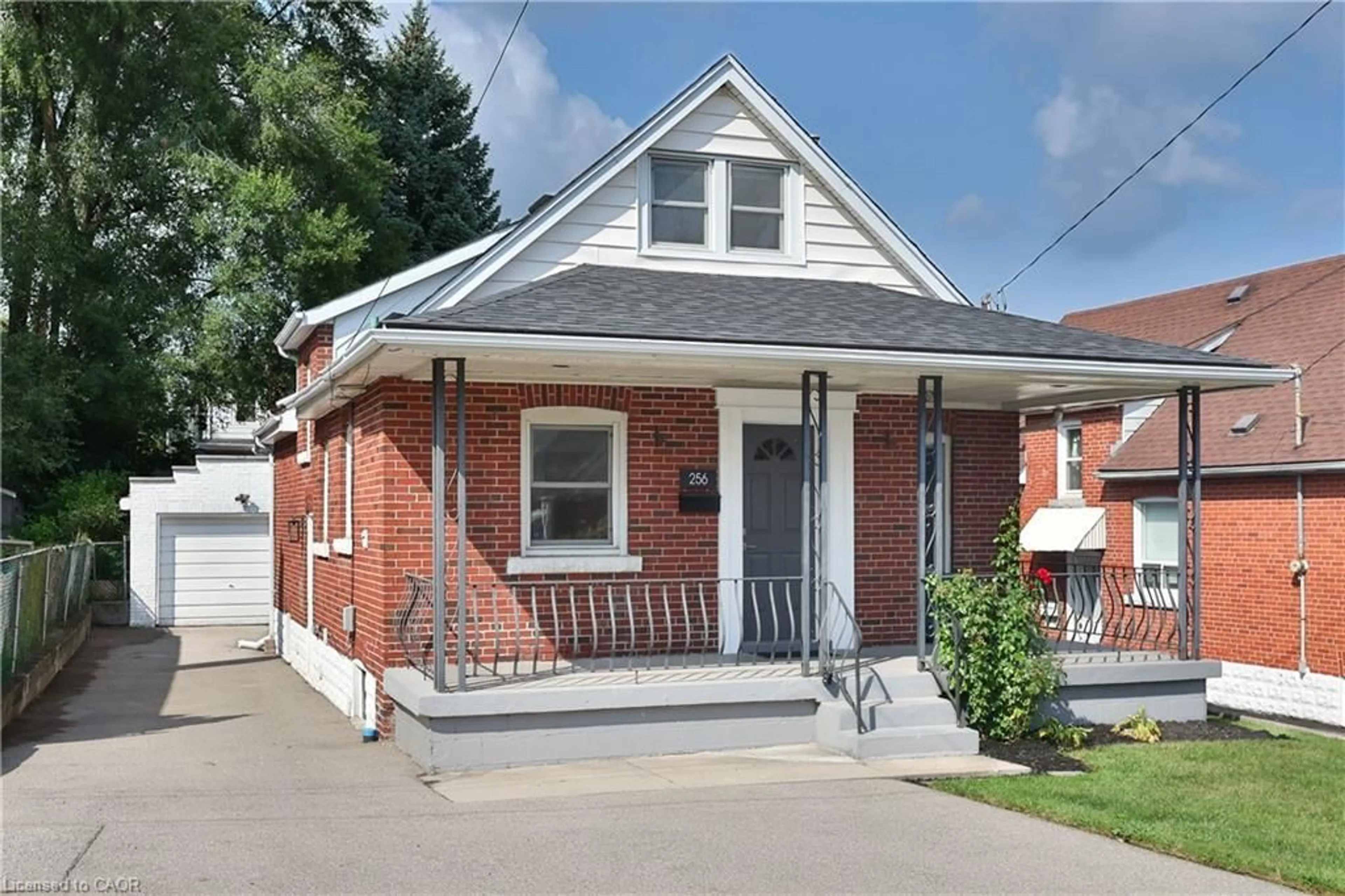 Home with brick exterior material, street for 256 Walter Ave, Hamilton Ontario L8K 3L4