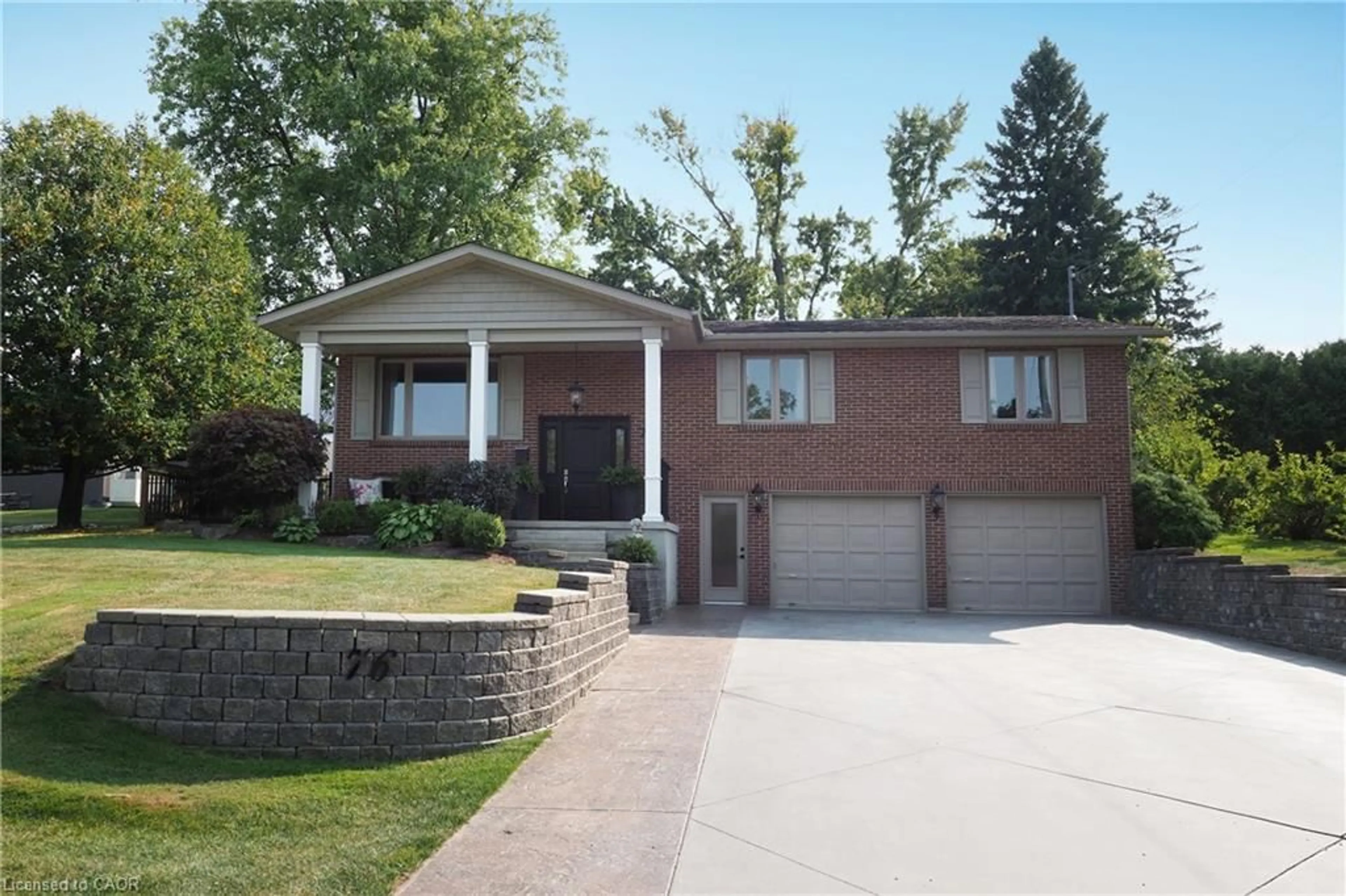 Home with brick exterior material, street for 76 Flaxmill Dr, Conestogo Ontario N0B 1N0