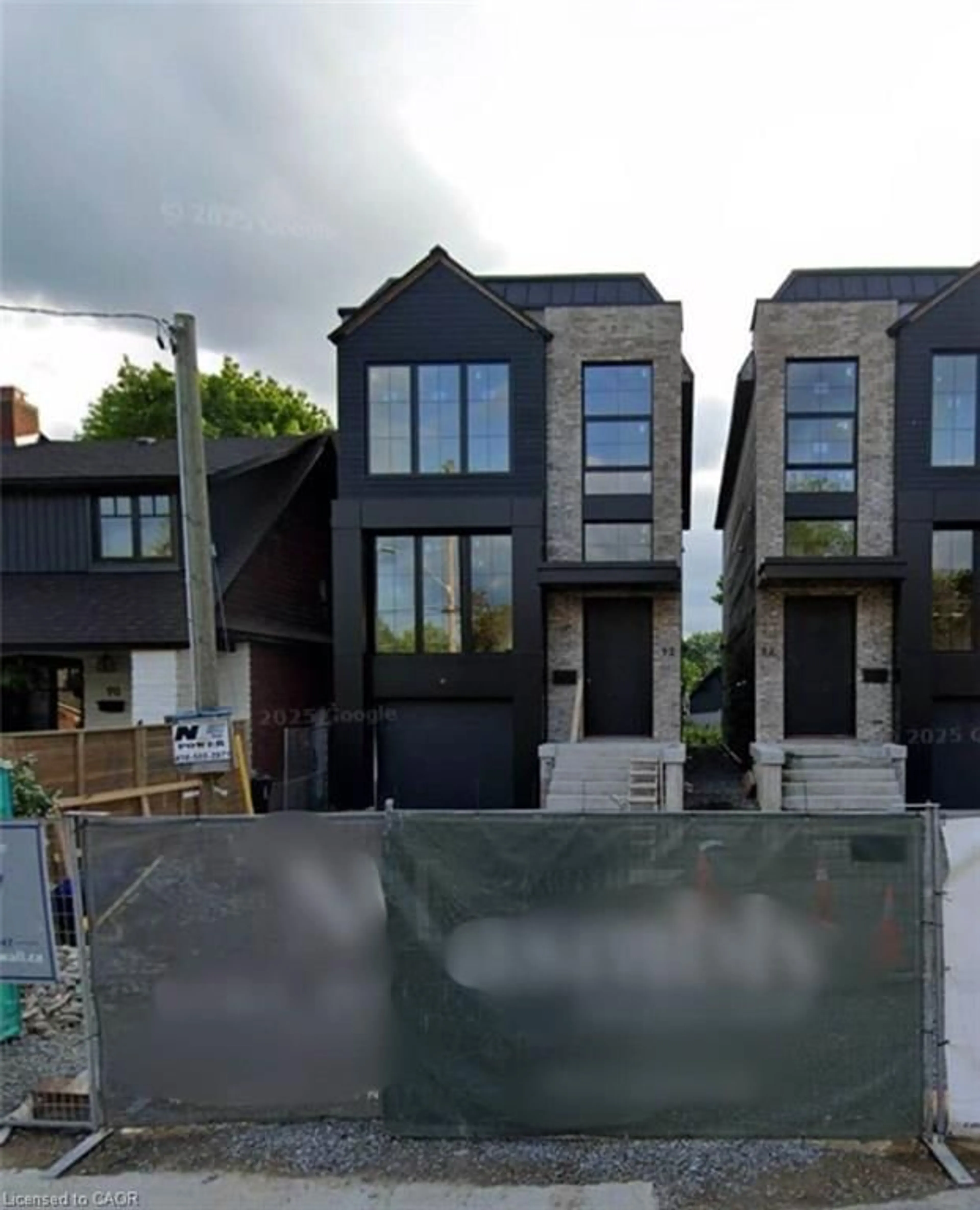 A pic from outside/outdoor area/front of a property/back of a property/a pic from drone, street for 92 Fifth St, Toronto Ontario M8V 2Z3