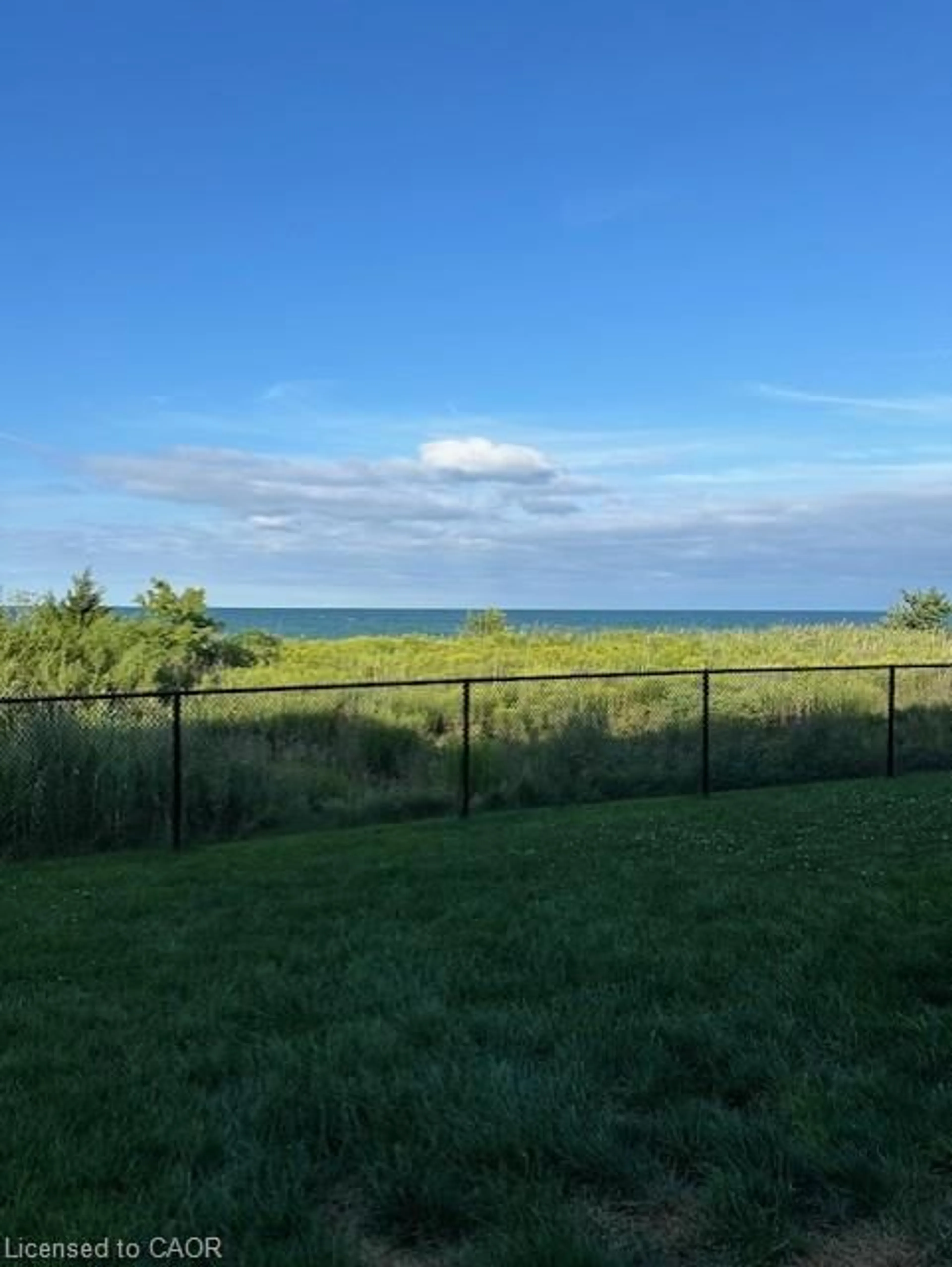 A pic from outside/outdoor area/front of a property/back of a property/a pic from drone, water/lake/river/ocean view for 35 Southshore Cres #303, Stoney Creek Ontario L8E 0J2