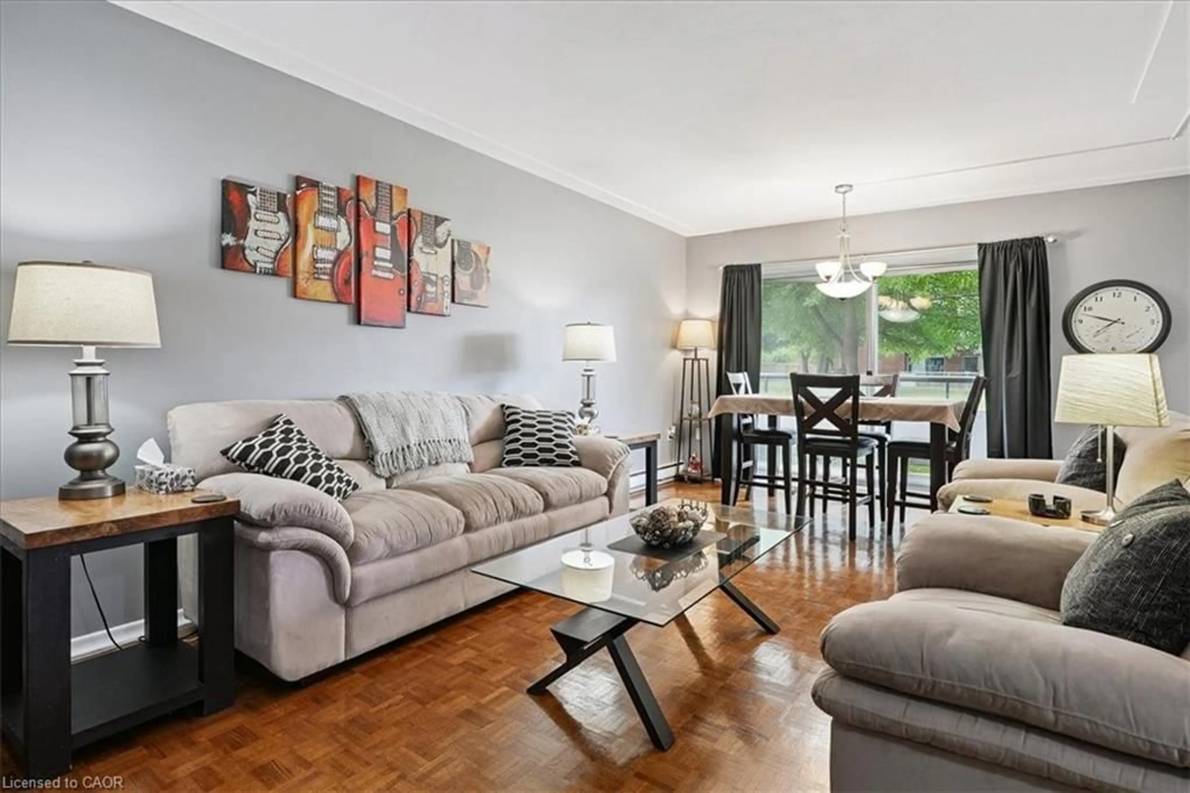 Living room with furniture, unknown for 11 Woodman Dr #102, Hamilton Ontario L8K 4E3