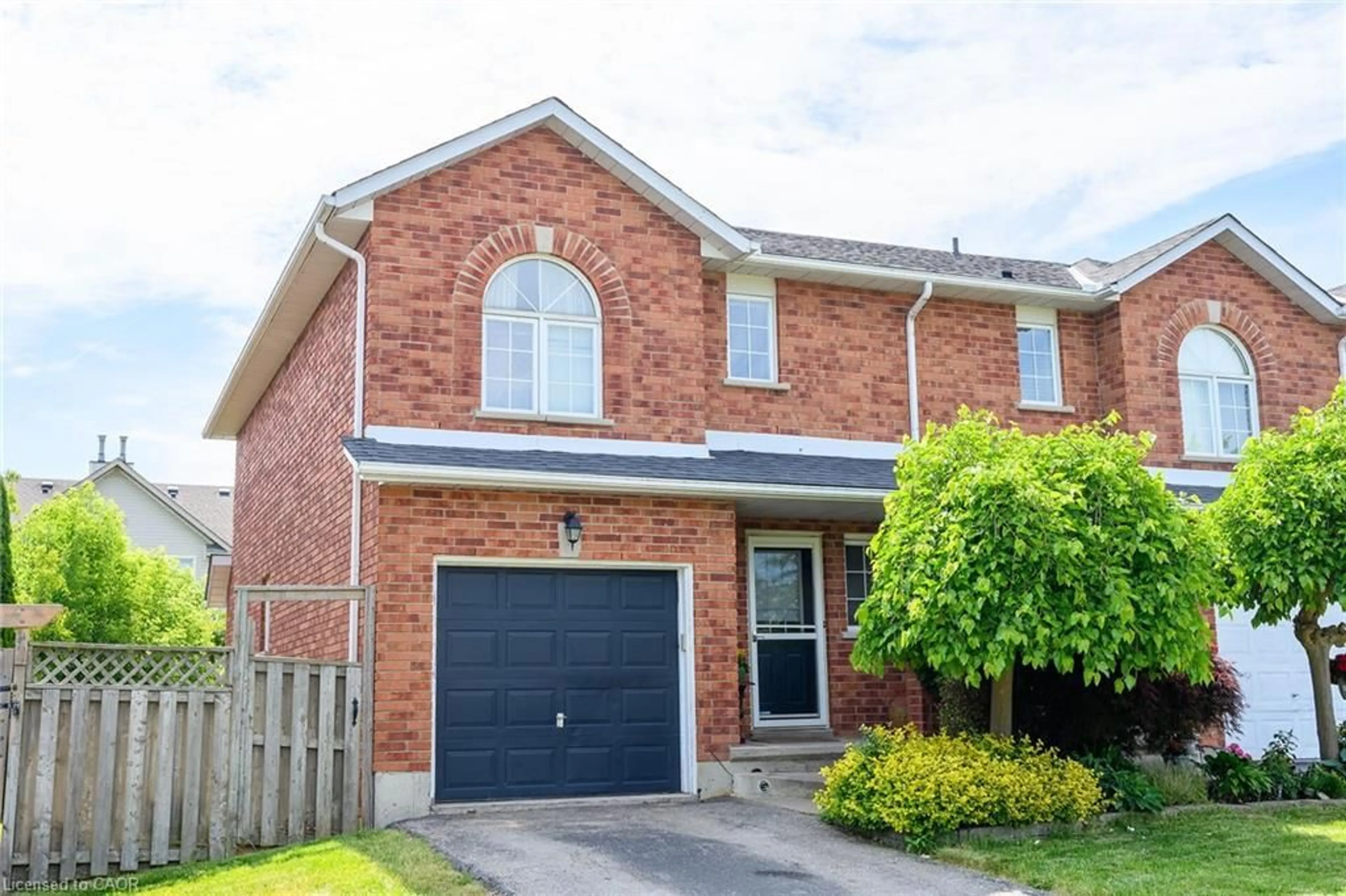 Home with brick exterior material, street for 67 Pinewoods Dr, Stoney Creek Ontario L8J 2T6