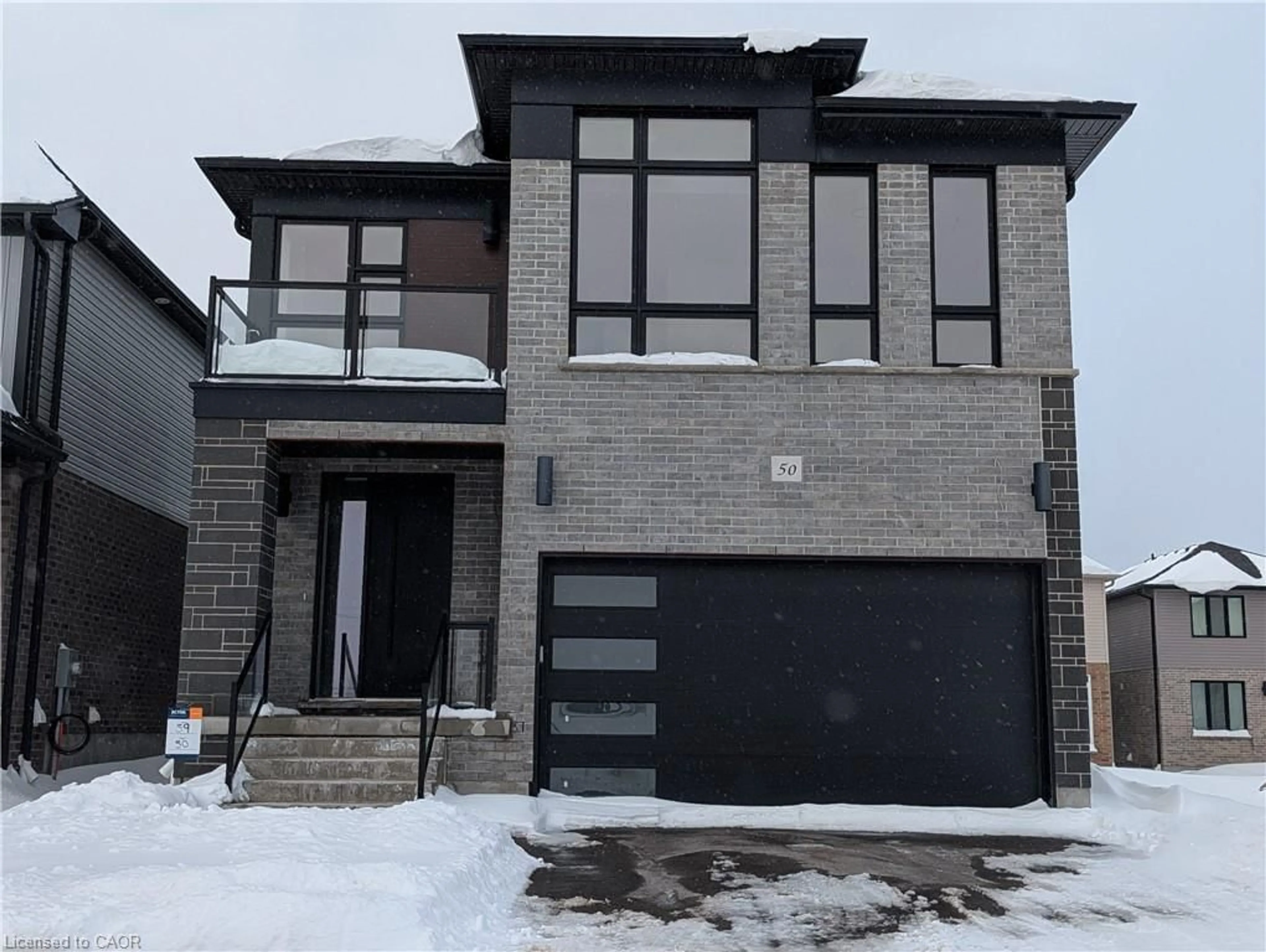 Home with brick exterior material, street for 50 Jacob Detweiller Dr, Kitchener Ontario N2P 0L1