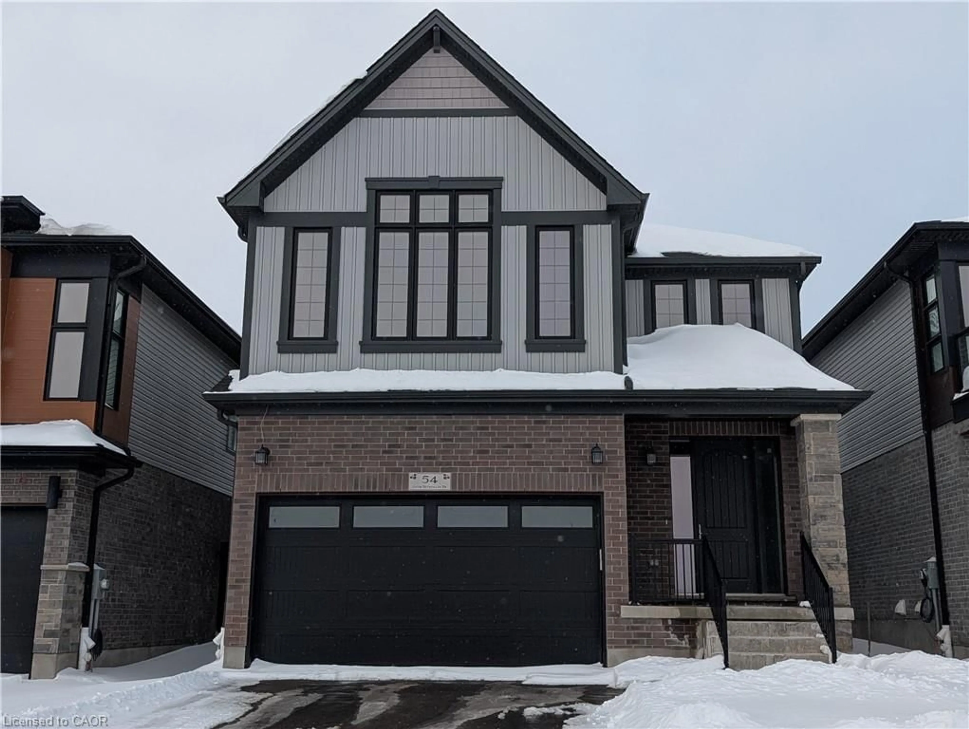 Home with brick exterior material, street for 54 Jacob Detweiller Dr, Kitchener Ontario N2P 0K7