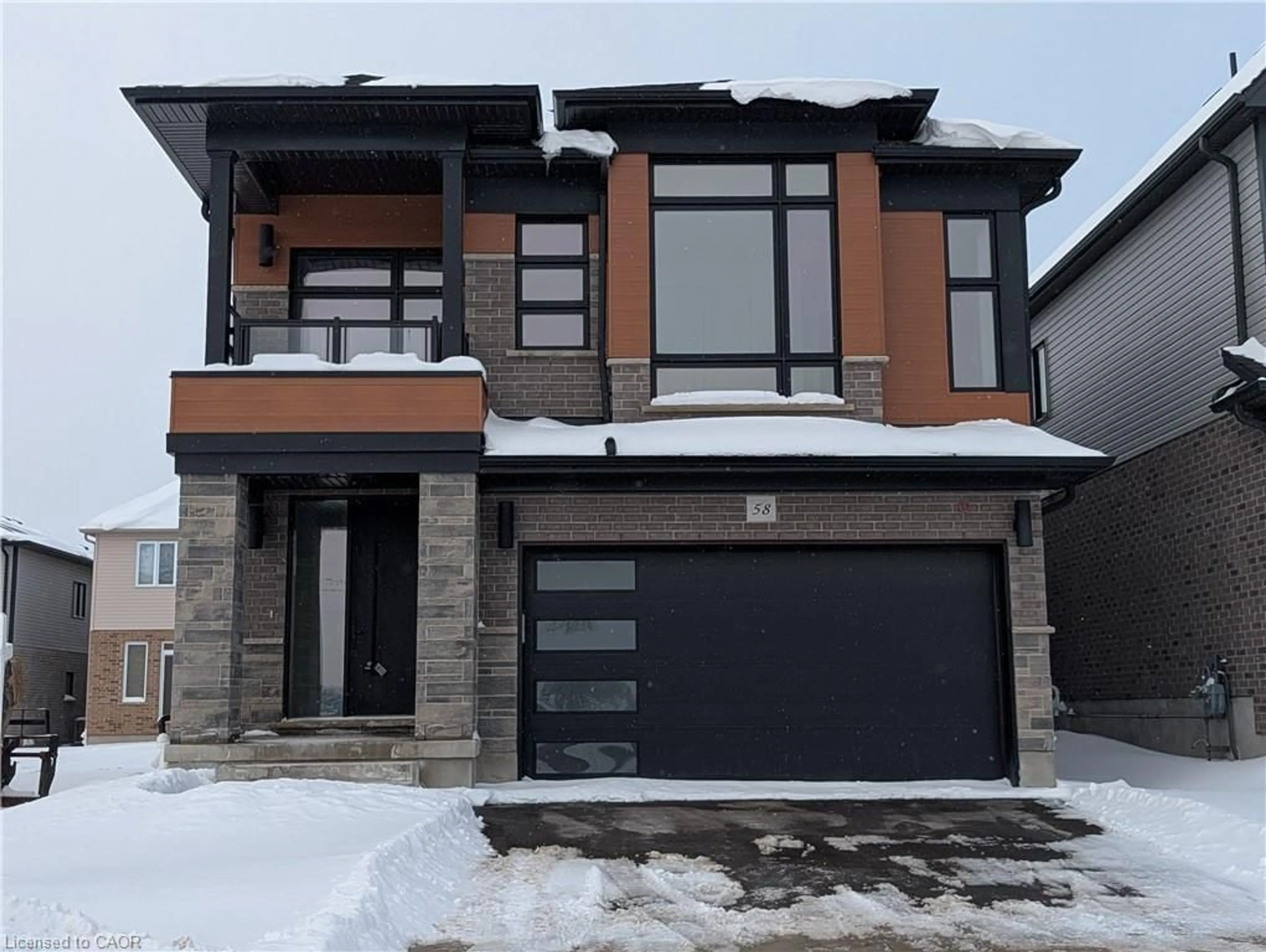 Home with brick exterior material, street for 58 Jacob Detweiller Dr, Kitchener Ontario N2P 0K7