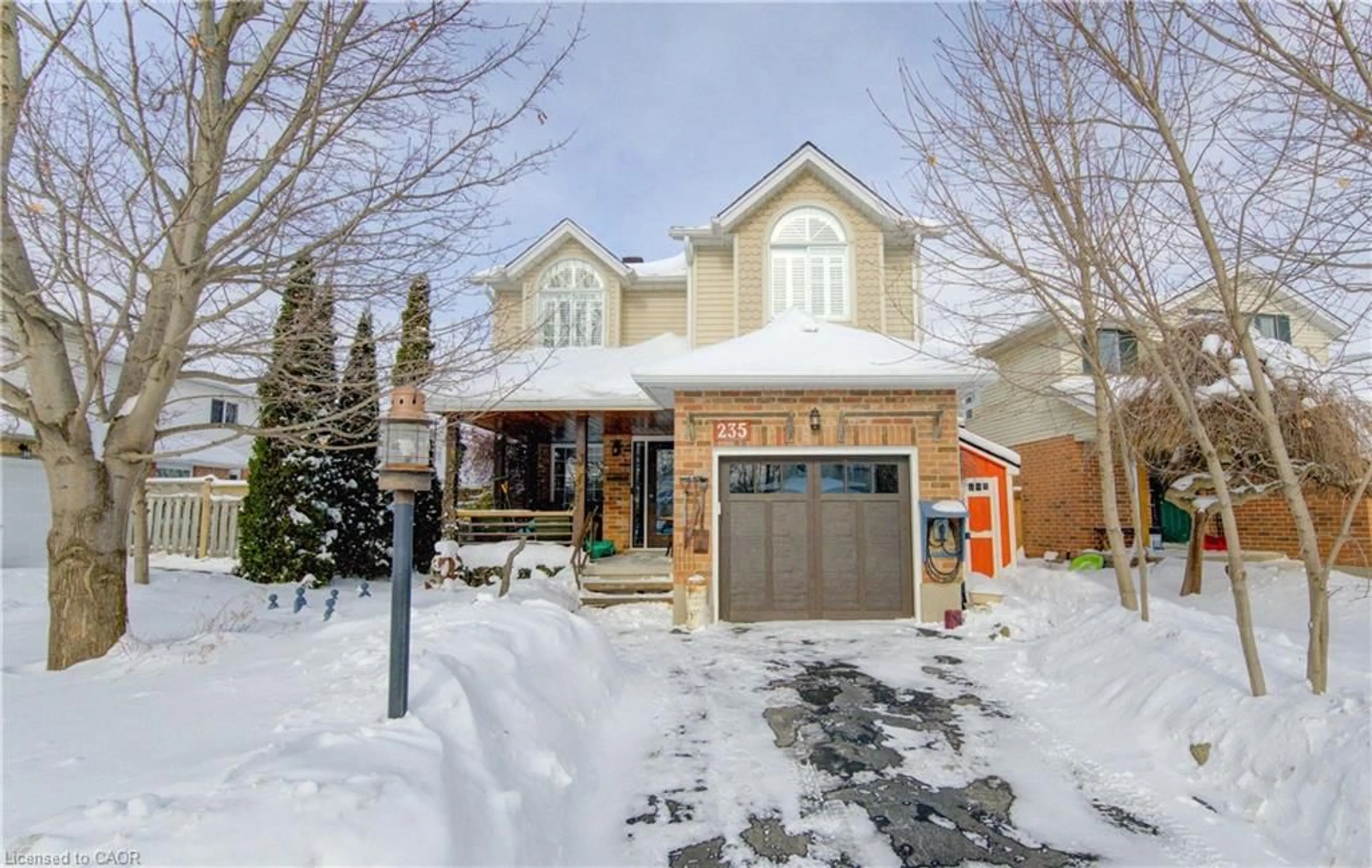 Home with brick exterior material, street for 235 Bush Clover Cres, Kitchener Ontario N2E 3P7