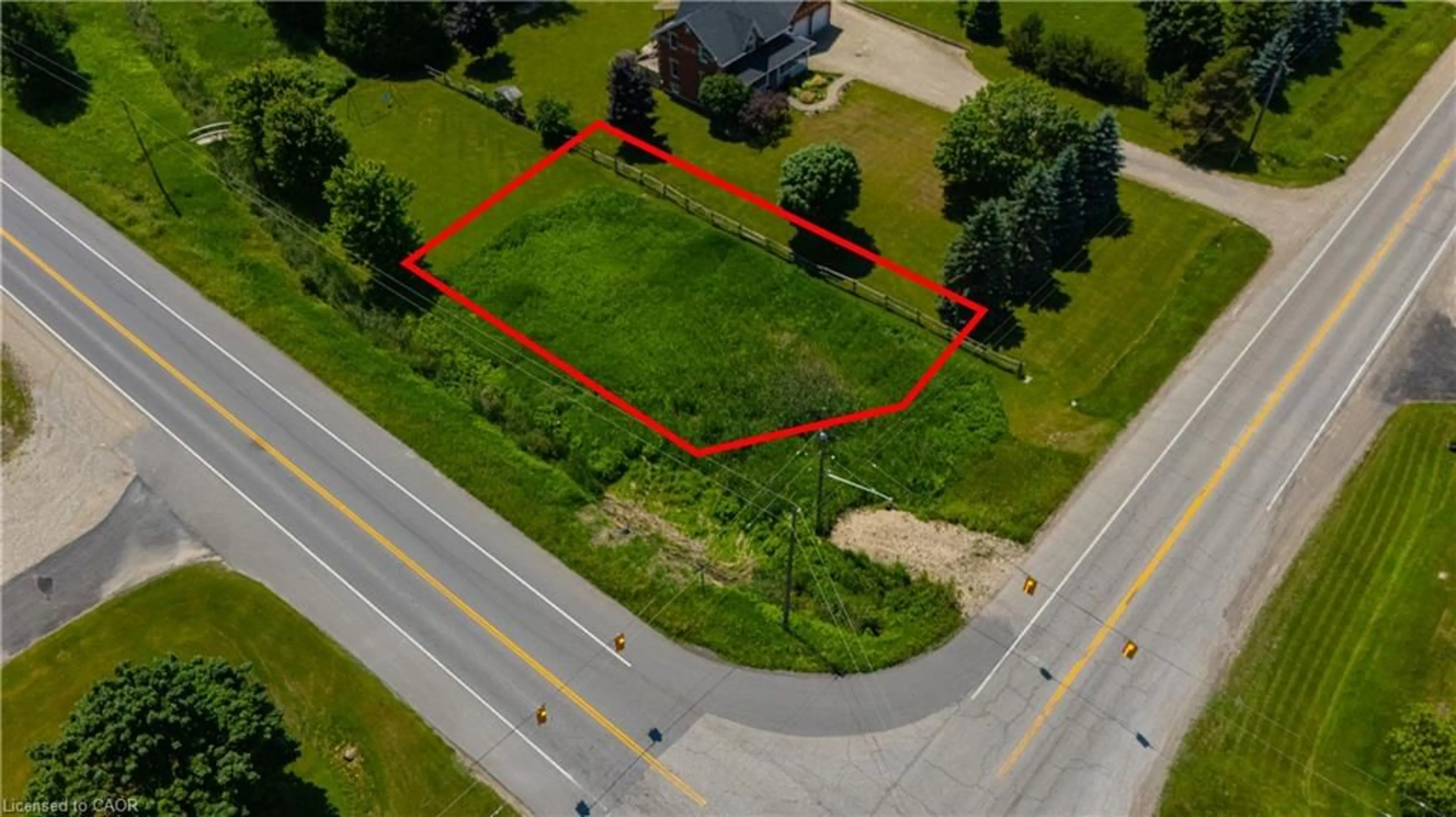 A pic from outside/outdoor area/front of a property/back of a property/a pic from drone, street for 7462 Wellington Rd 11, Moorefield Ontario N0G 2K0