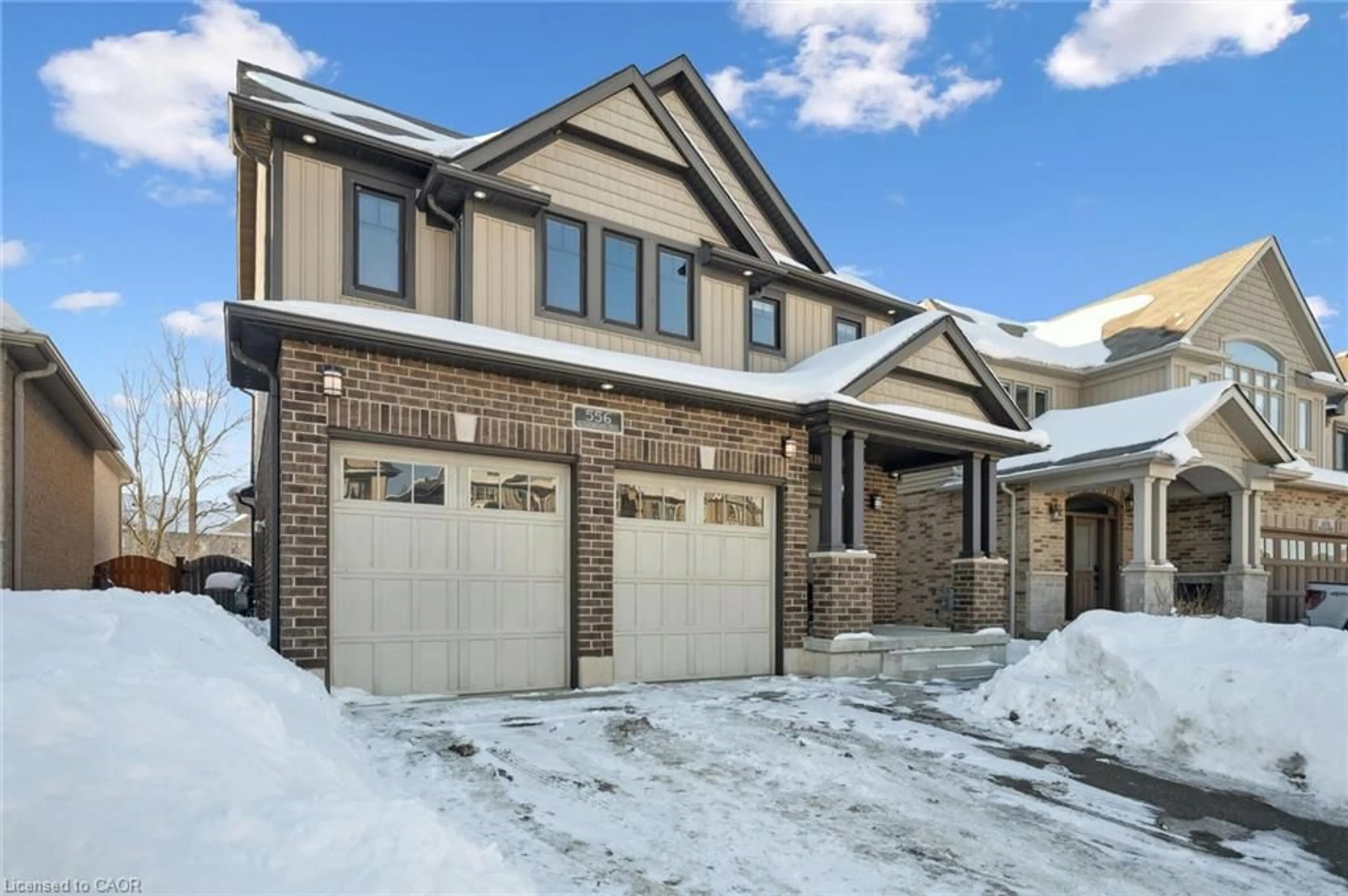 Home with brick exterior material, street for 556 Netherwood Cres, Kitchener Ontario N2P 0B8