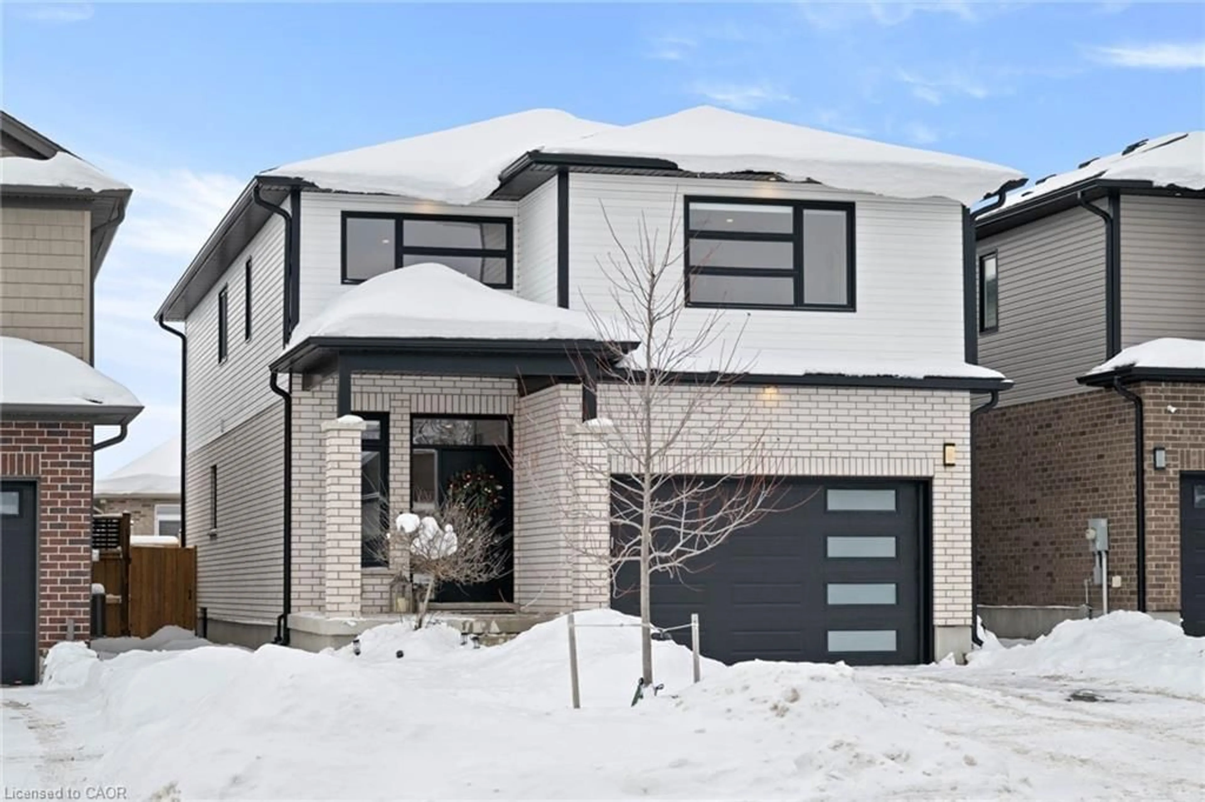 Home with brick exterior material, street for 215 Timber Trail Rd, Elmira Ontario N3B 0C5