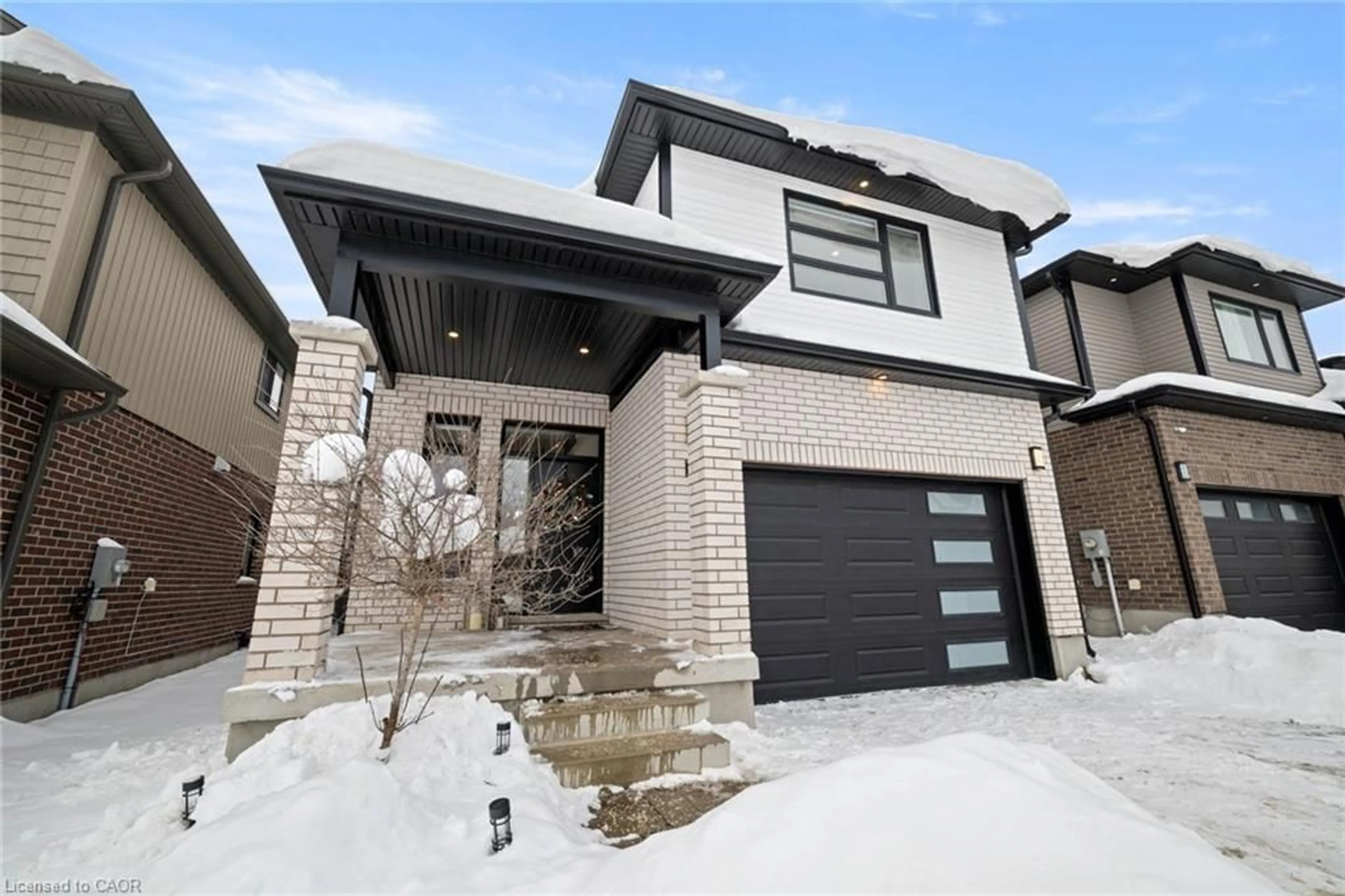 Home with brick exterior material, street for 215 Timber Trail Rd, Elmira Ontario N3B 0C5