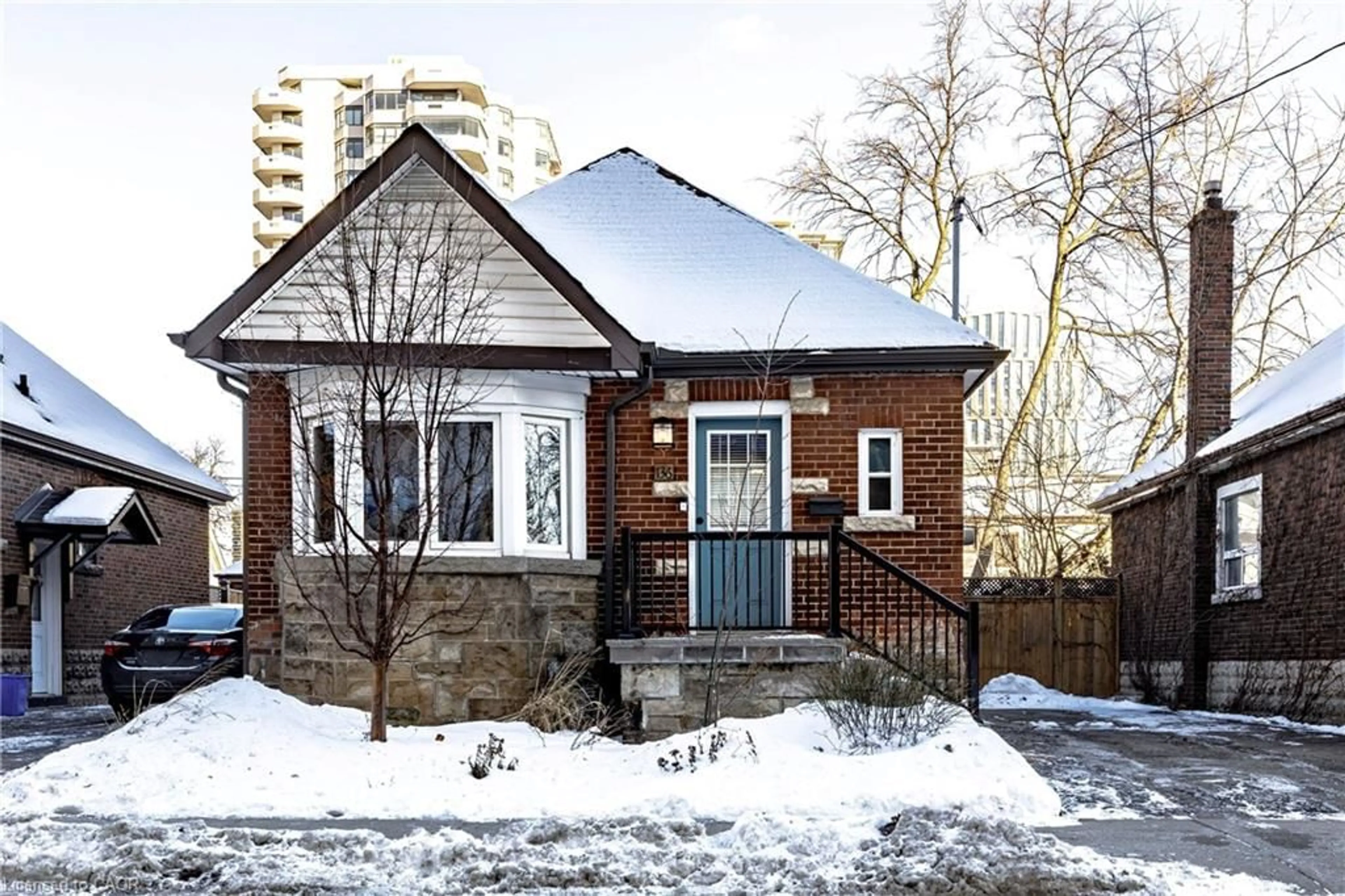 Home with brick exterior material, street for 136 Hunter St, Hamilton Ontario L8P 1R1