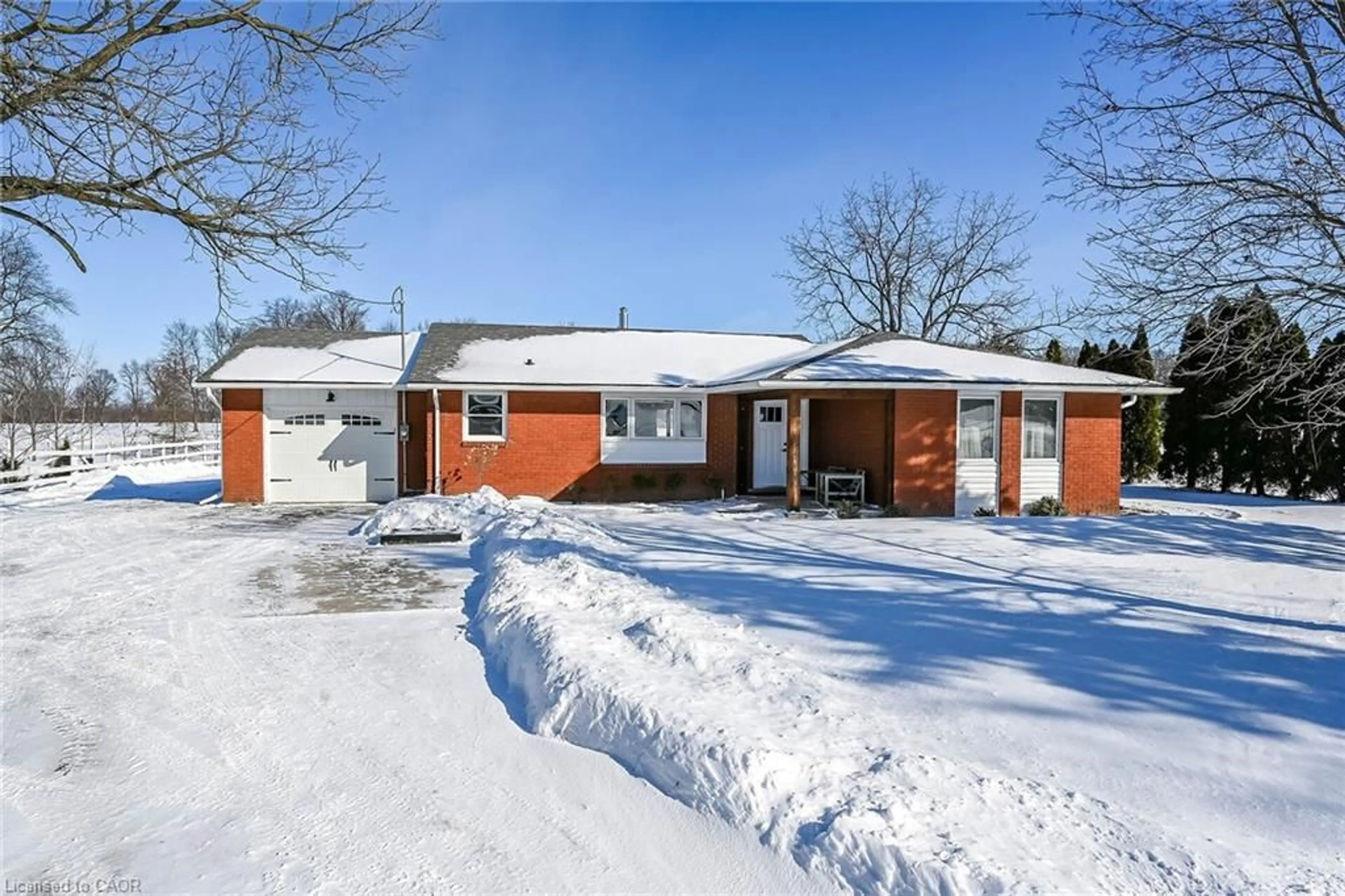 Home with brick exterior material, street for 4024 River Rd, Caledonia Ontario N3W 1T6