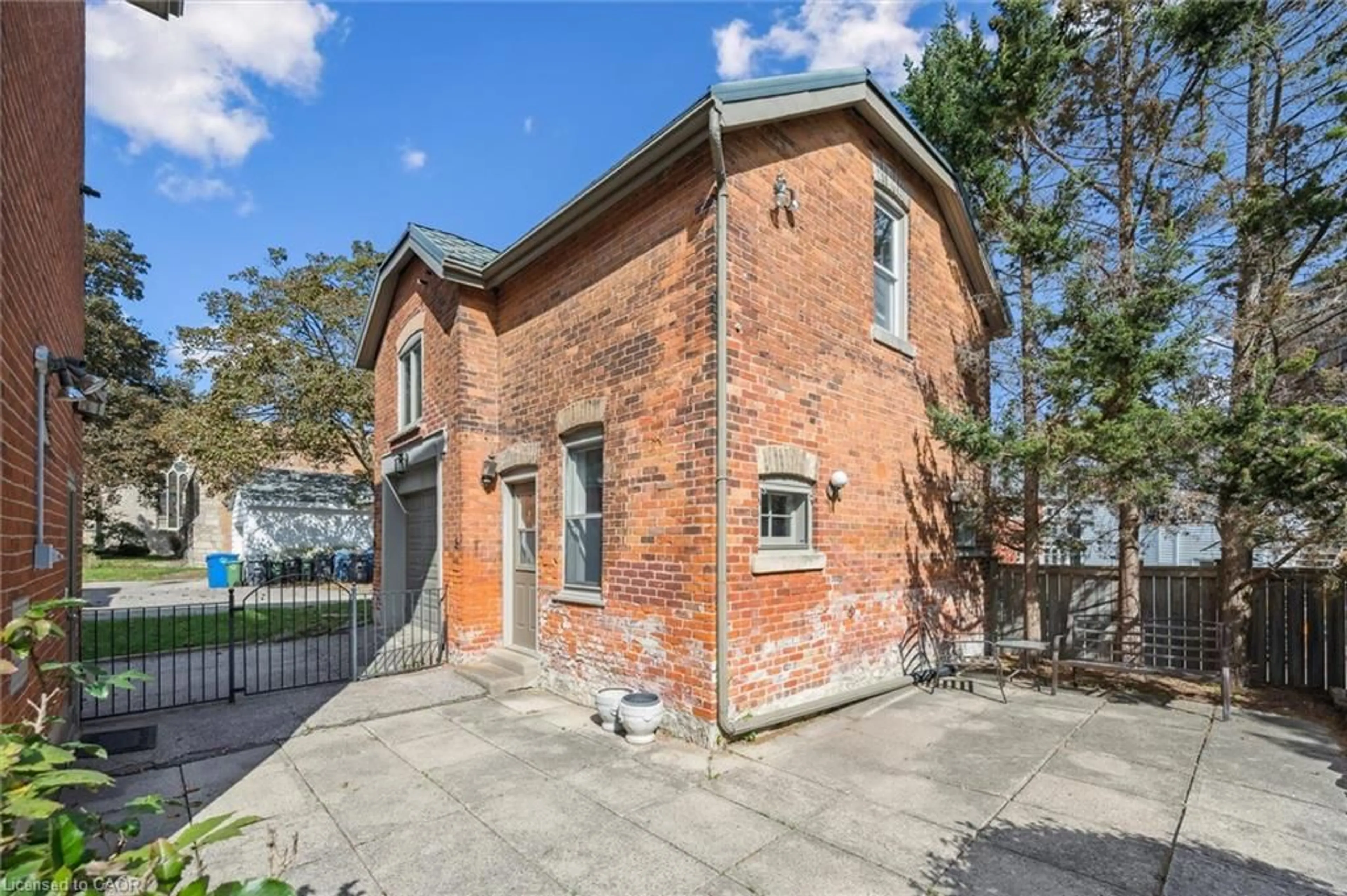 Home with brick exterior material, street for 143 Norfolk St, Guelph Ontario N1H 4J7