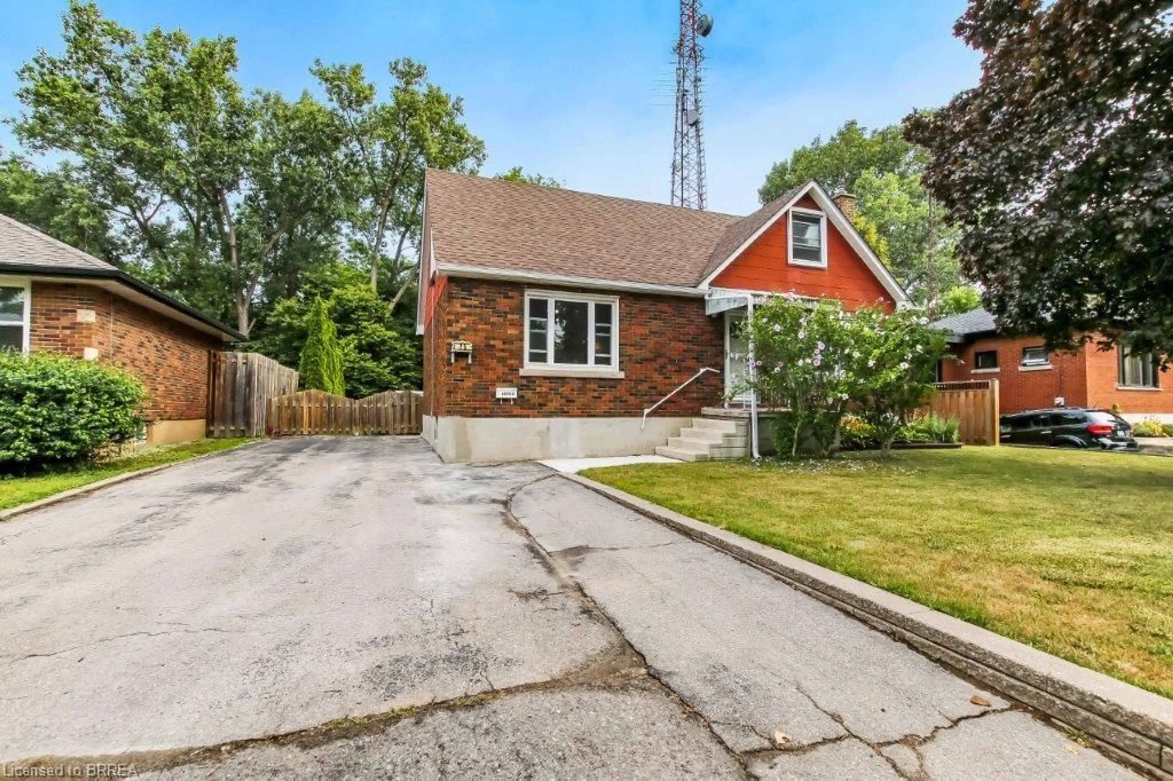 Home with brick exterior material, street for 25 Henry St, Brantford Ontario N3R 1Z9