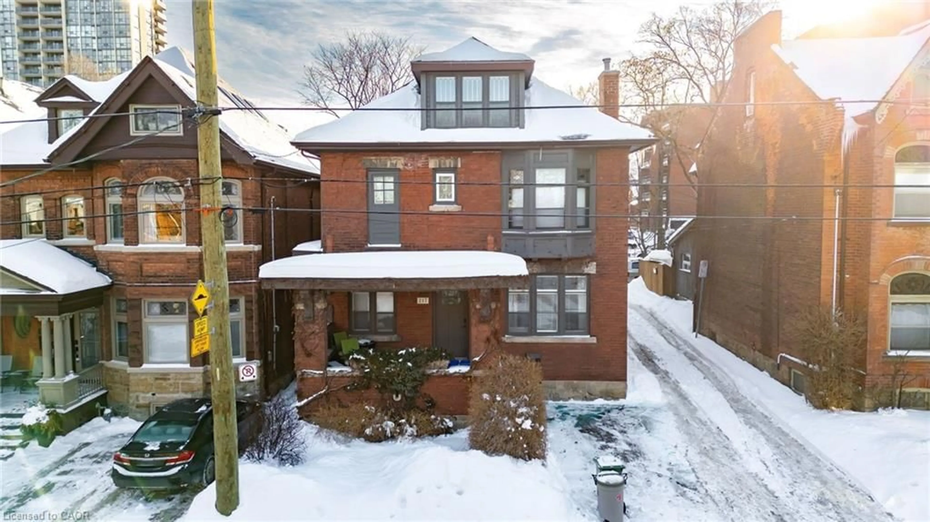 A pic from outside/outdoor area/front of a property/back of a property/a pic from drone, street for 217 Caroline St, Hamilton Ontario L8P 3L5