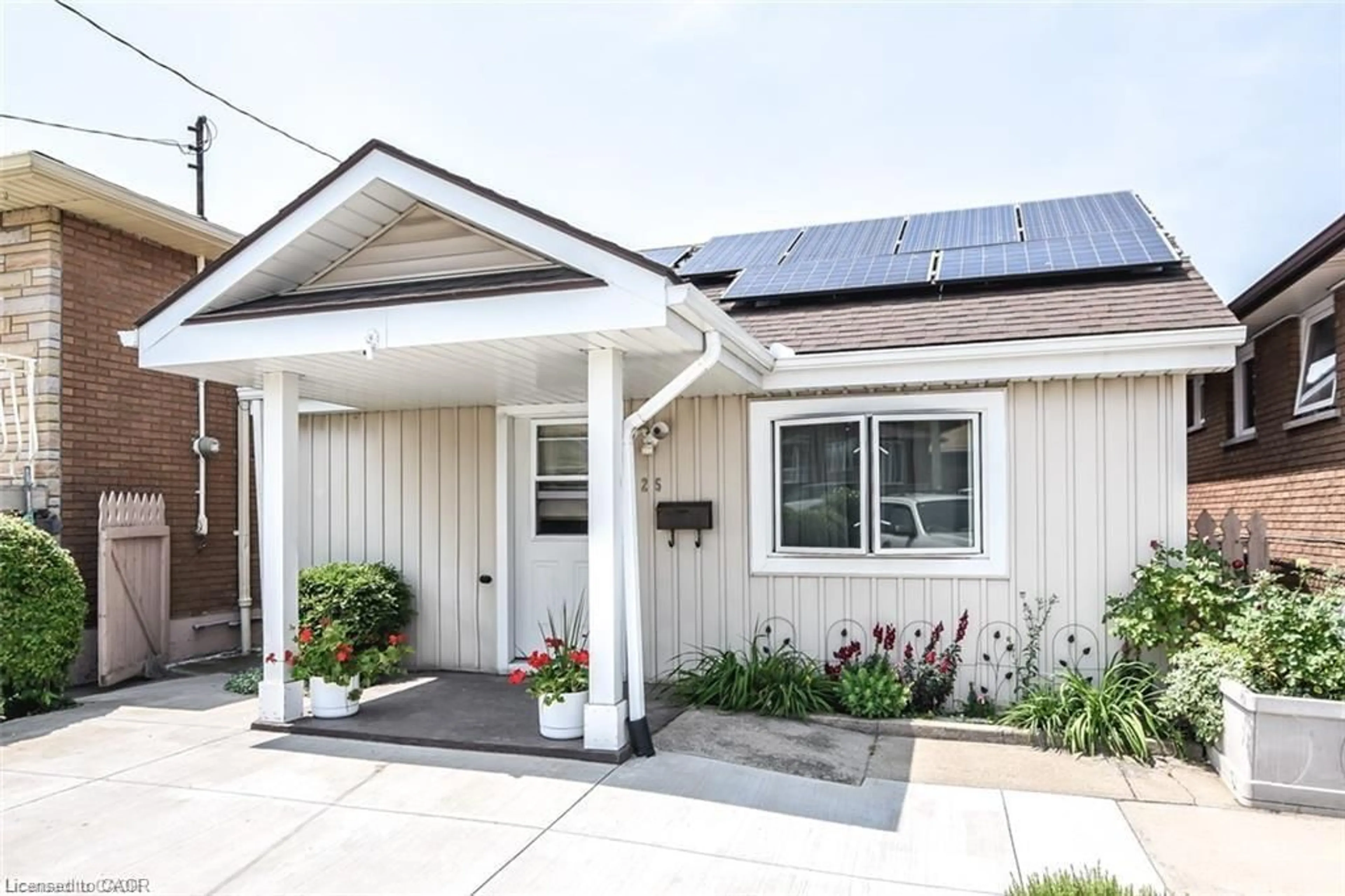 Home with vinyl exterior material, street for 25 Delena Ave, Hamilton Ontario L8H 6B5