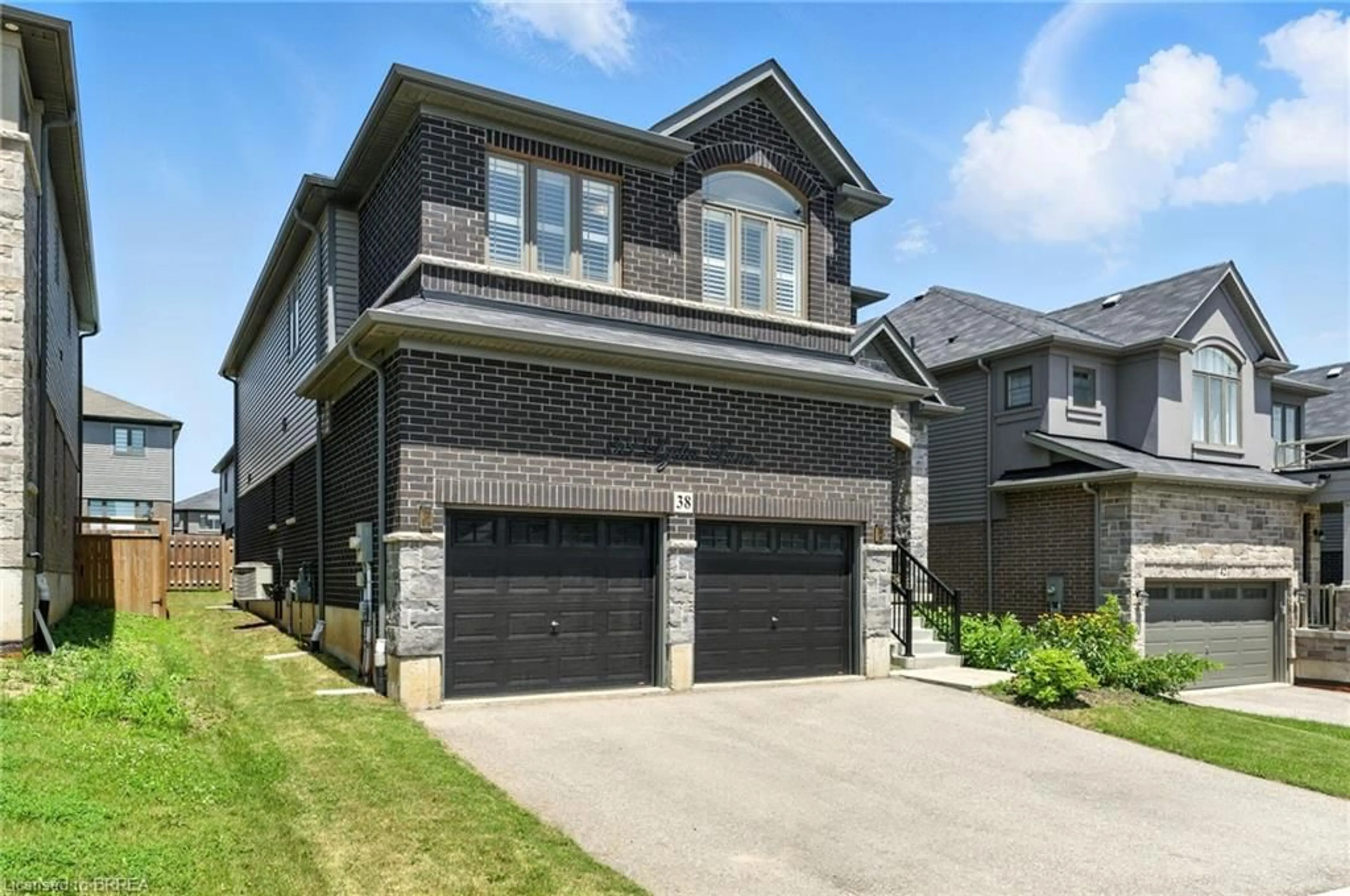 Home with brick exterior material, street for 38 Lydia Lane, Paris Ontario N3L 0H5