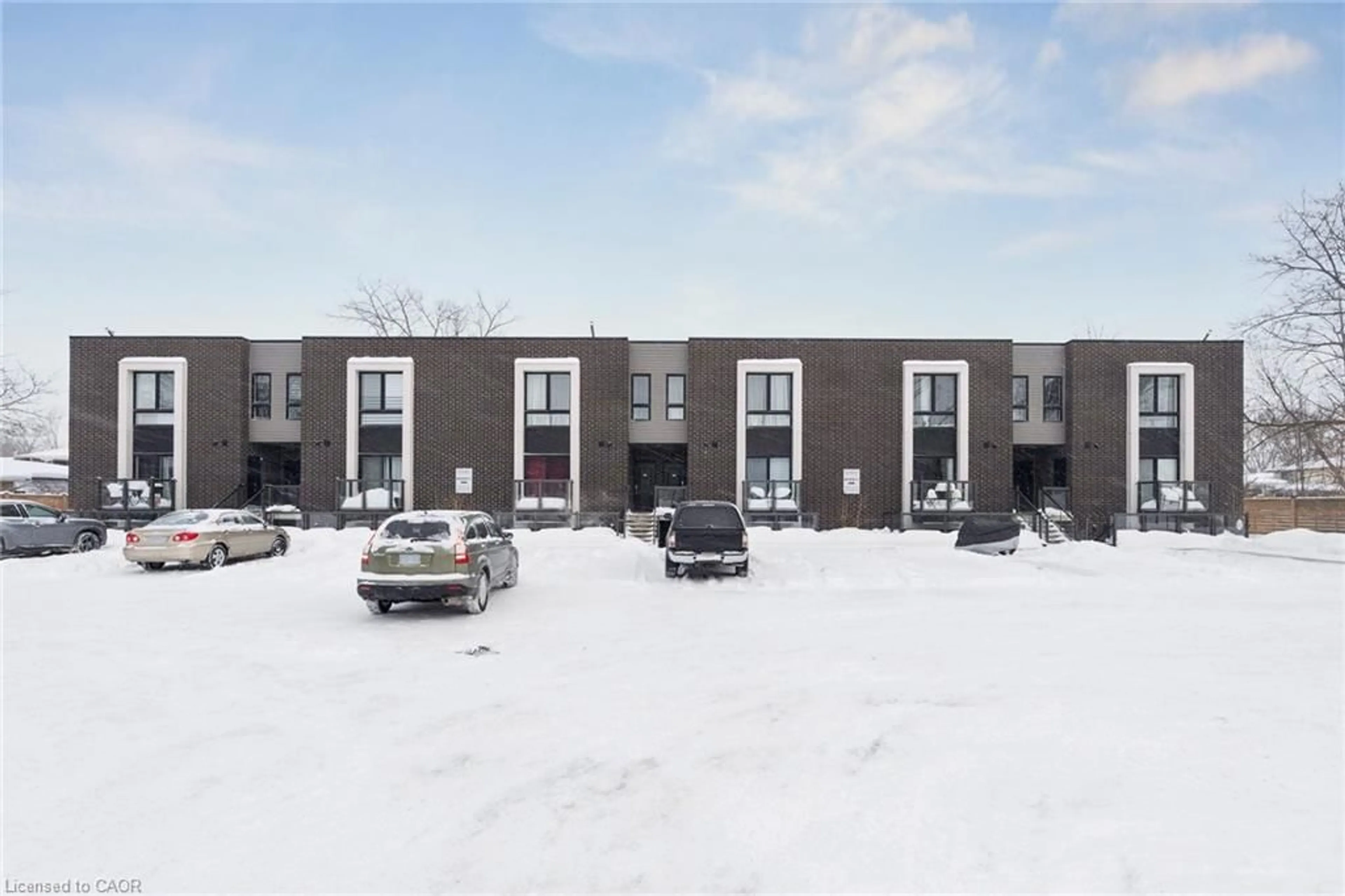 A pic from outside/outdoor area/front of a property/back of a property/a pic from drone, building for 6065 Mcleod Rd #204, Niagara Falls Ontario L2G 0G7