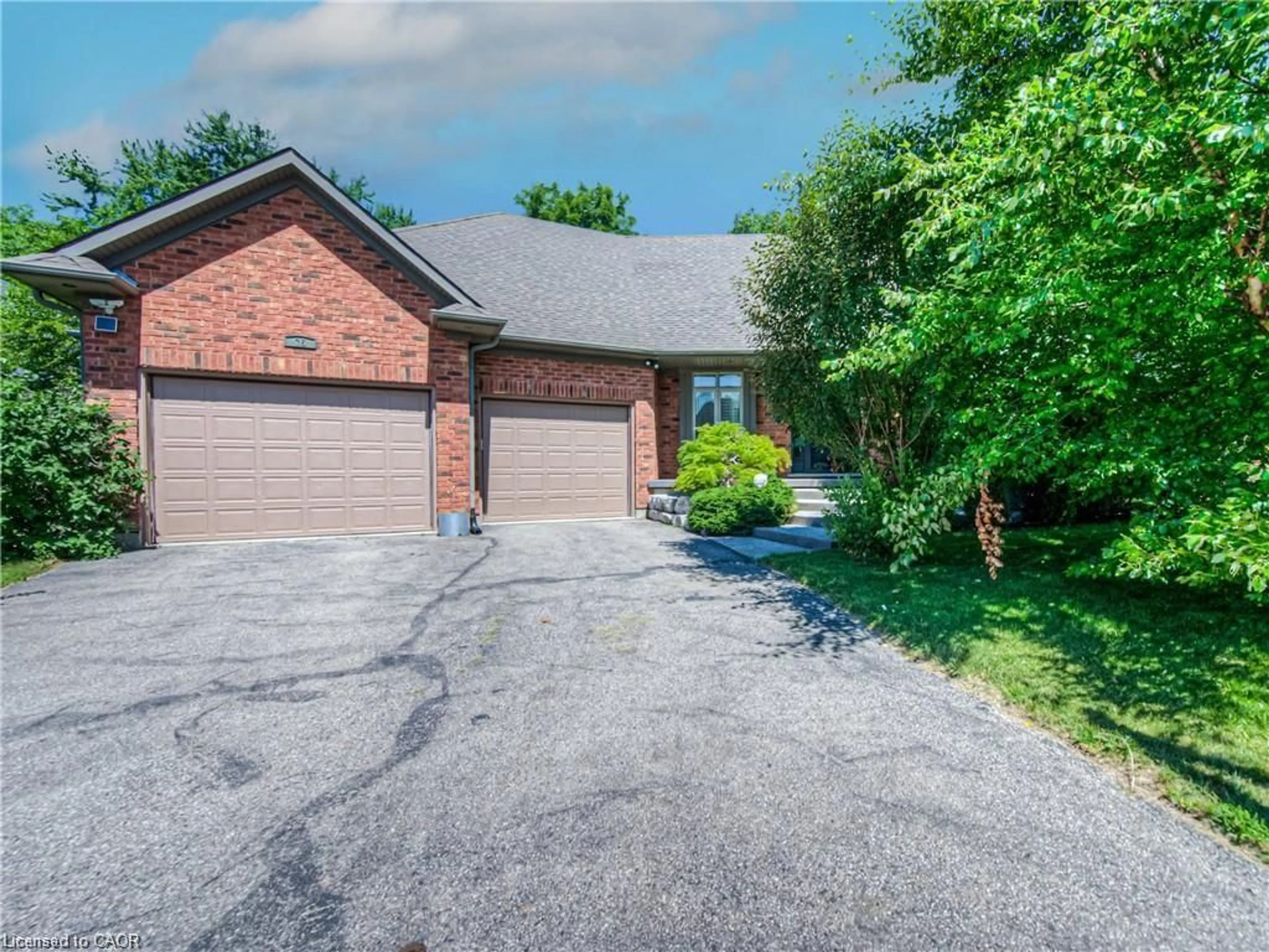 Home with brick exterior material, street for 75 Wagon St, Kitchener Ontario N2P 2V2