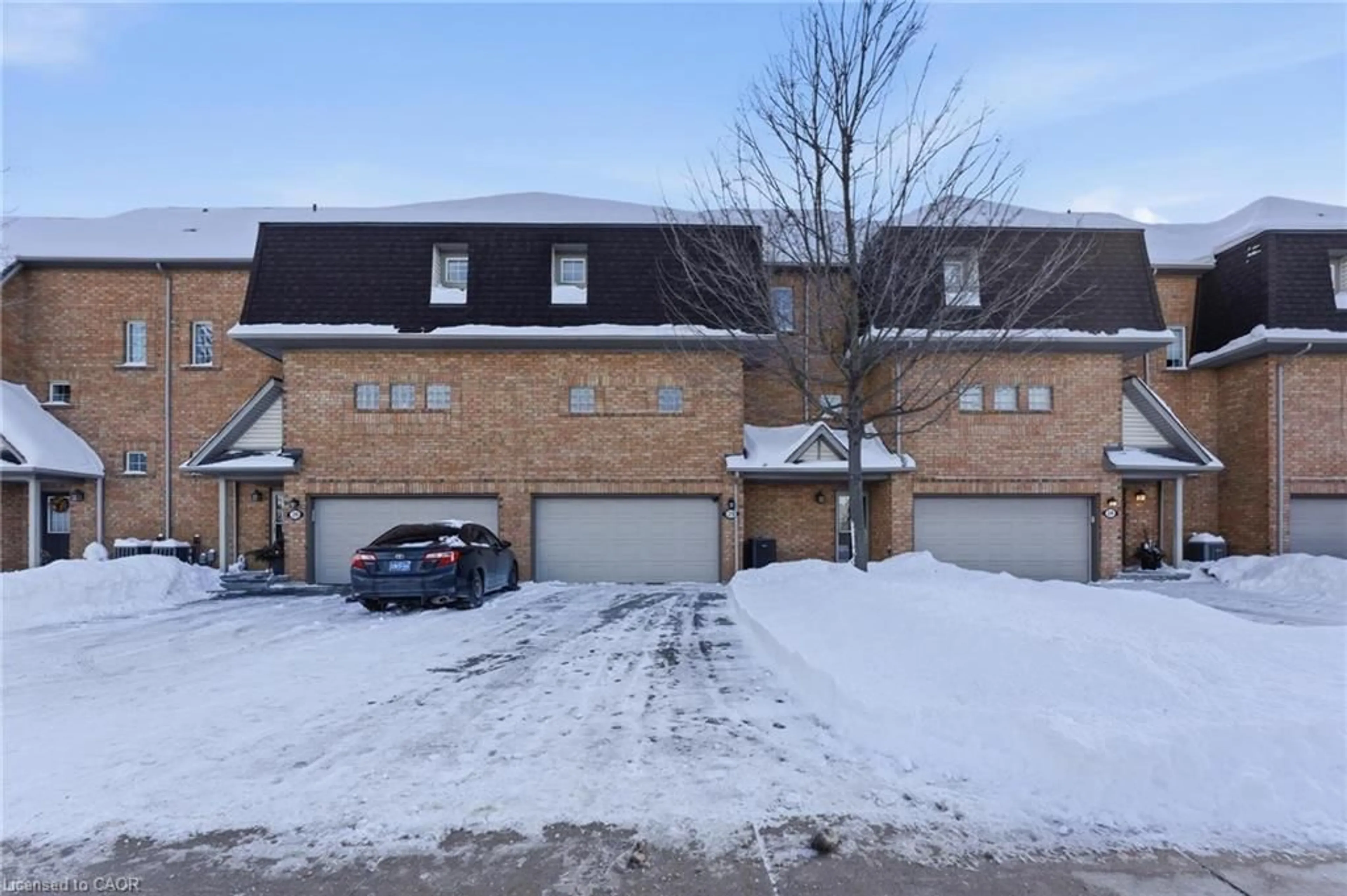 A pic from outside/outdoor area/front of a property/back of a property/a pic from drone, street for 100 Beddoe Dr #25, Hamilton Ontario L8P 4Z2