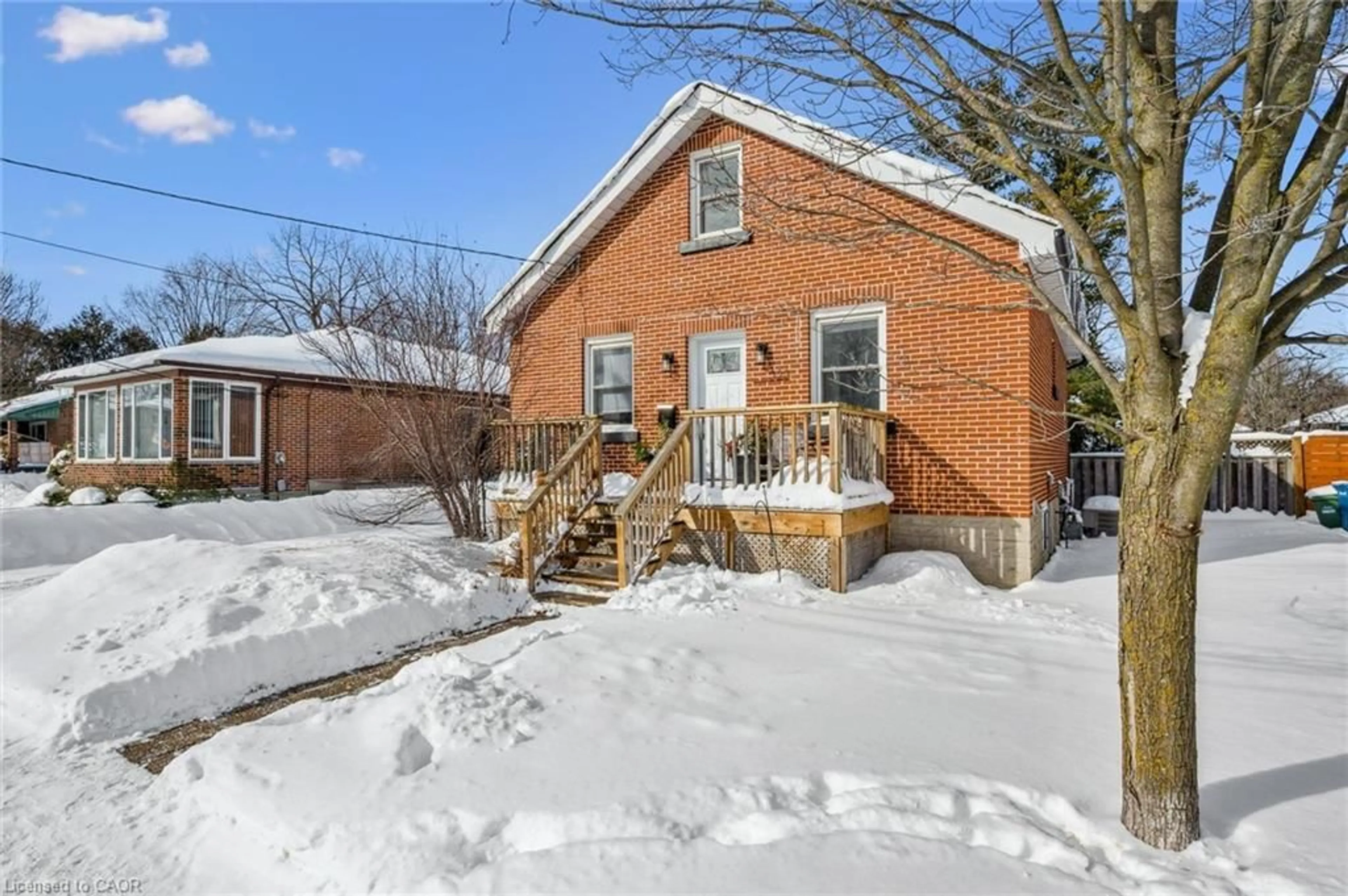 Home with brick exterior material, street for 323 Paisley Rd, Guelph Ontario N1H 2R1